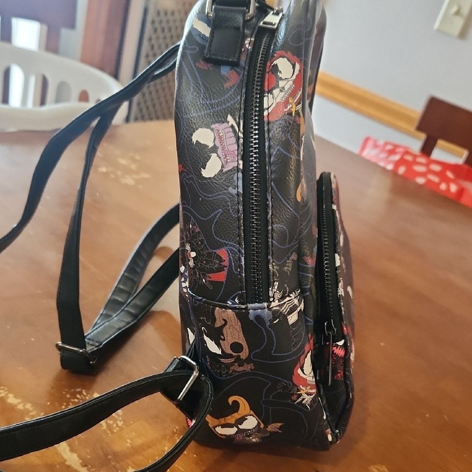 Loungefly Marvel Character Print Backpack – Black and Multicolor