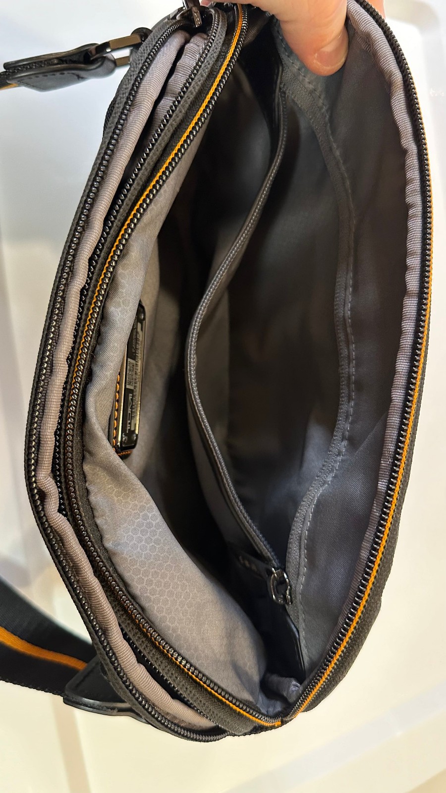 Tumi McLaren Lumin Utility Pouch Sling Crossbody Waist Bag Black Orange Travel