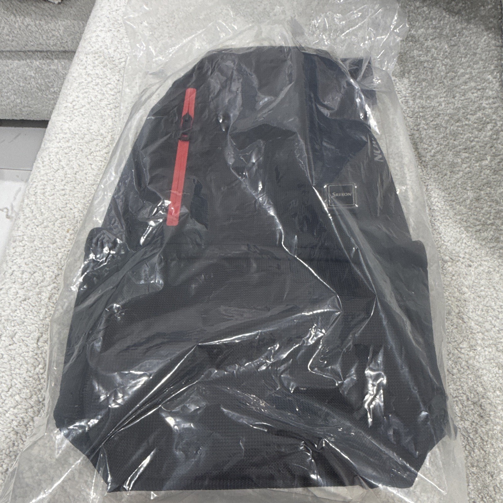 Srixon Black/Red Backpack, Zip & Buckle Closure, Adjustable Strap, Pockets