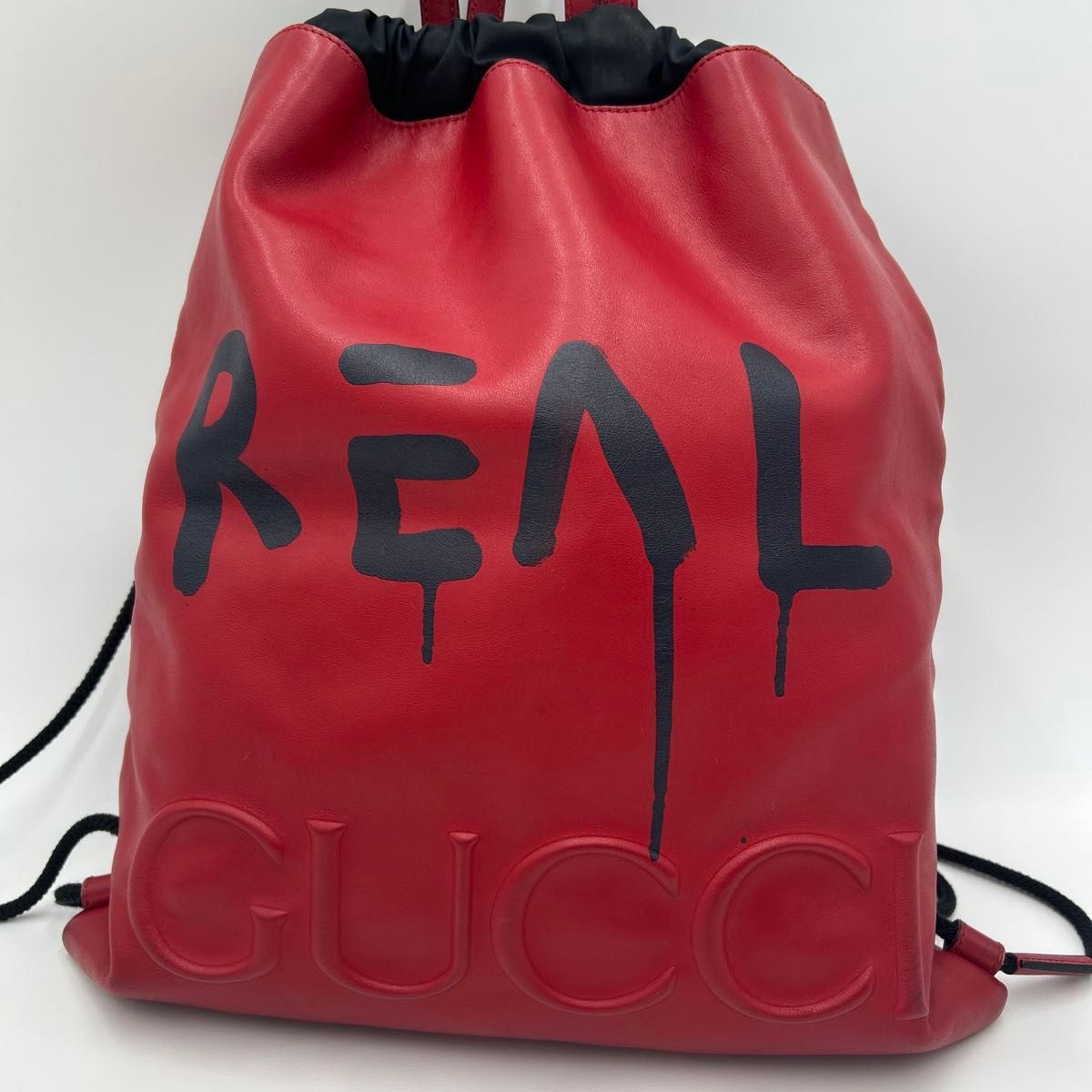 GUCCI men’s backpack daypack Leather drawstring red logo print 44.5×38cm