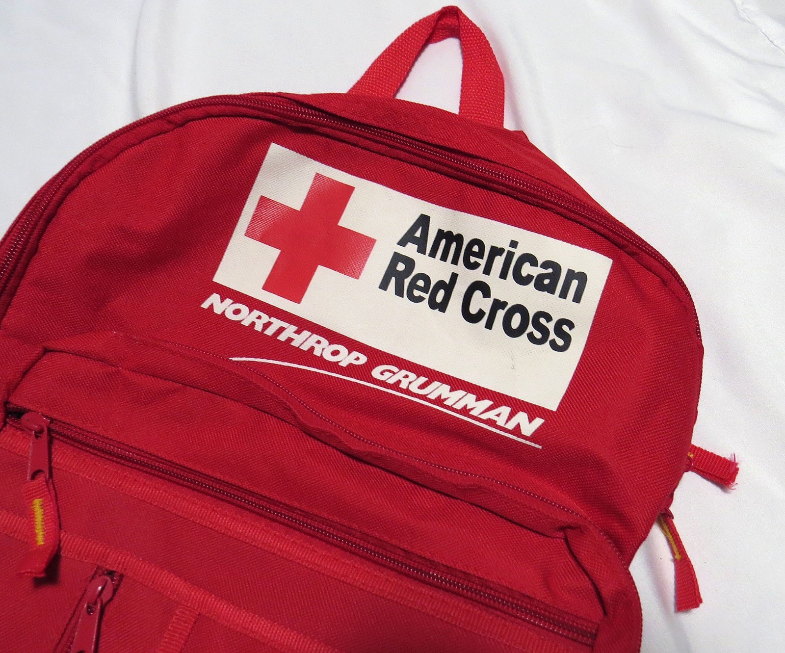 Northrop Grumman AMERICAN RED CROSS Backpack Adult Zip Adjust Strap