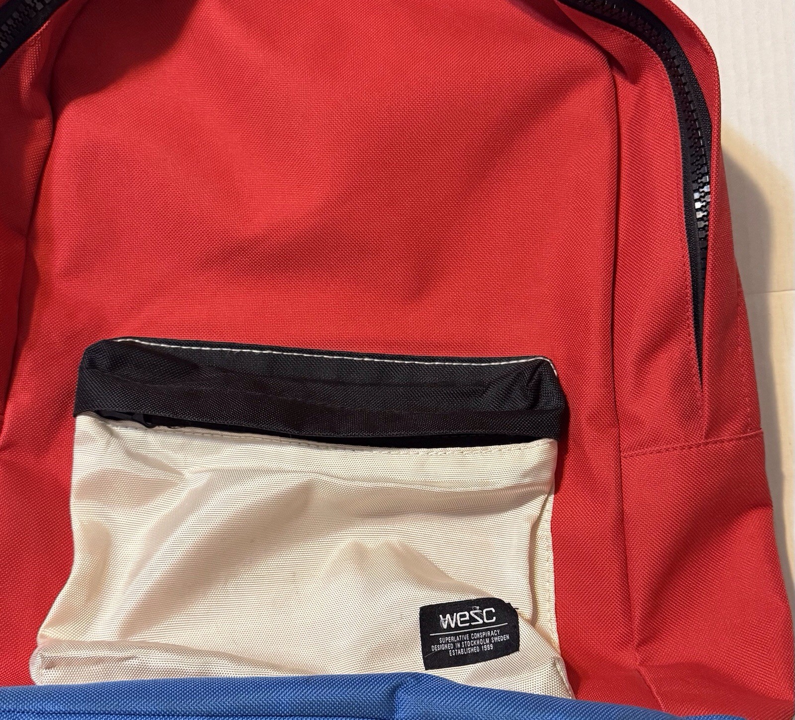 WeSC Red White Blue Chaz Coated Designer Zipper Unisex Backpack $88