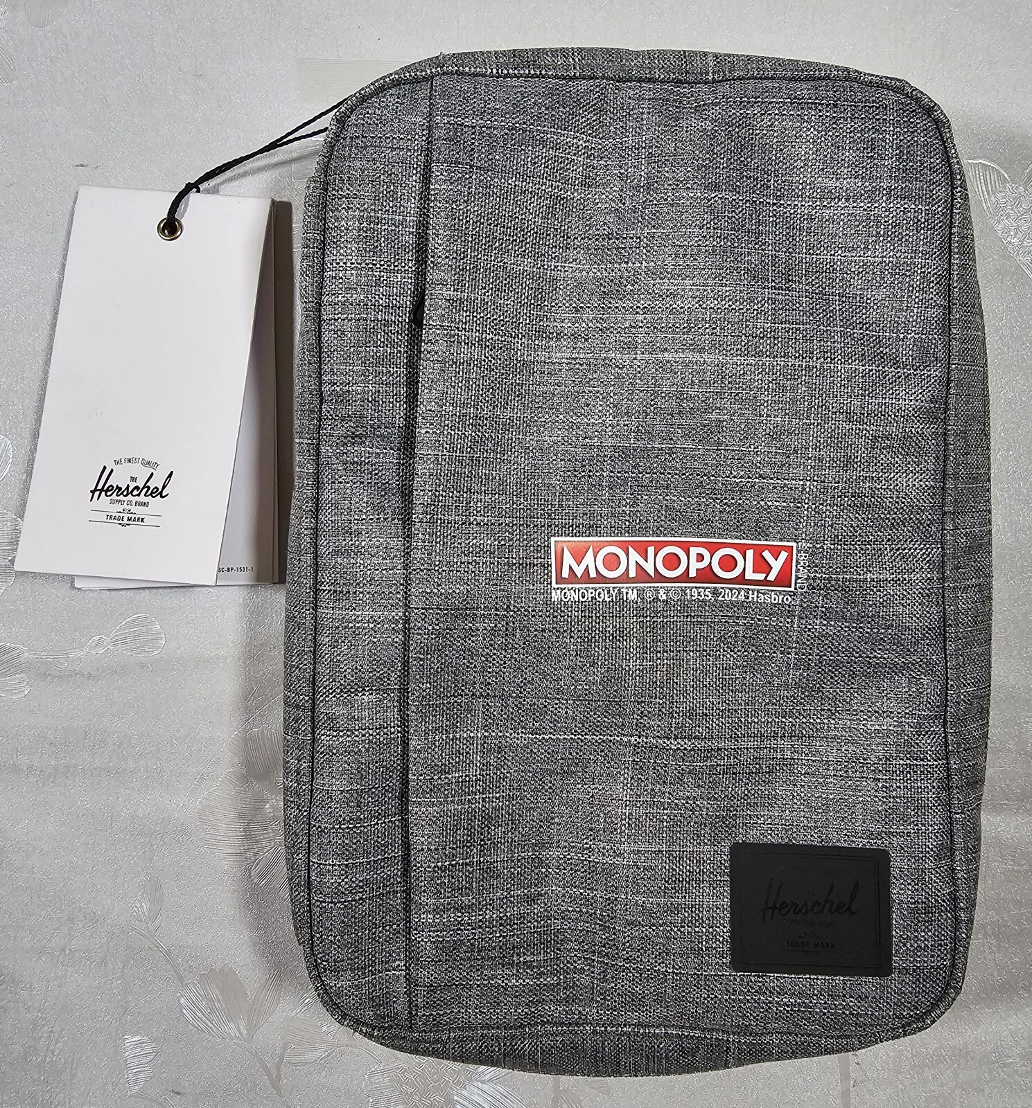 Herschel Burrard Organizer Tech Bag Raven Crosshatch Gray Monopoly Logo NWT