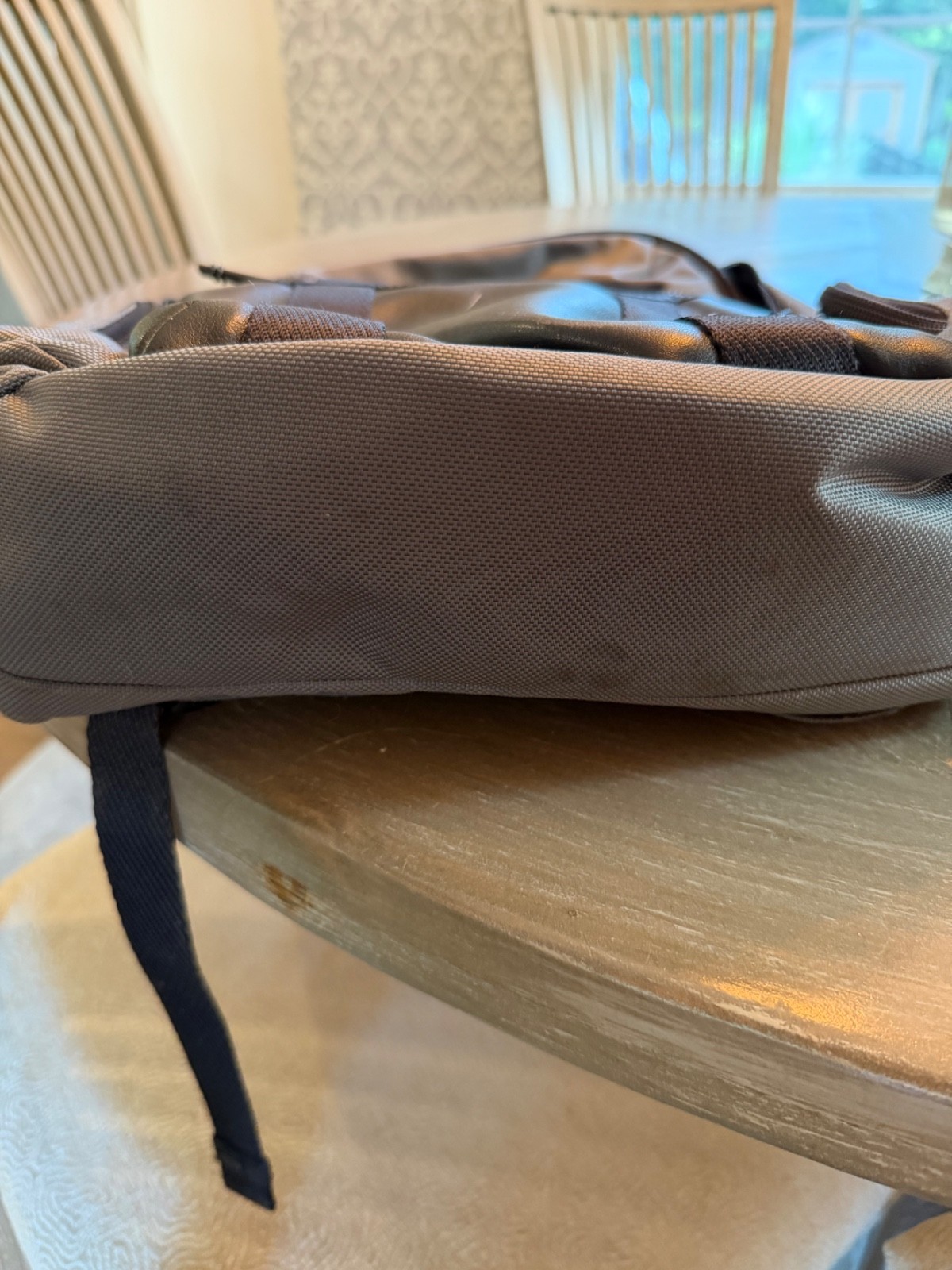 tumi backpack gray and black – has a couple of marks shown in pictures