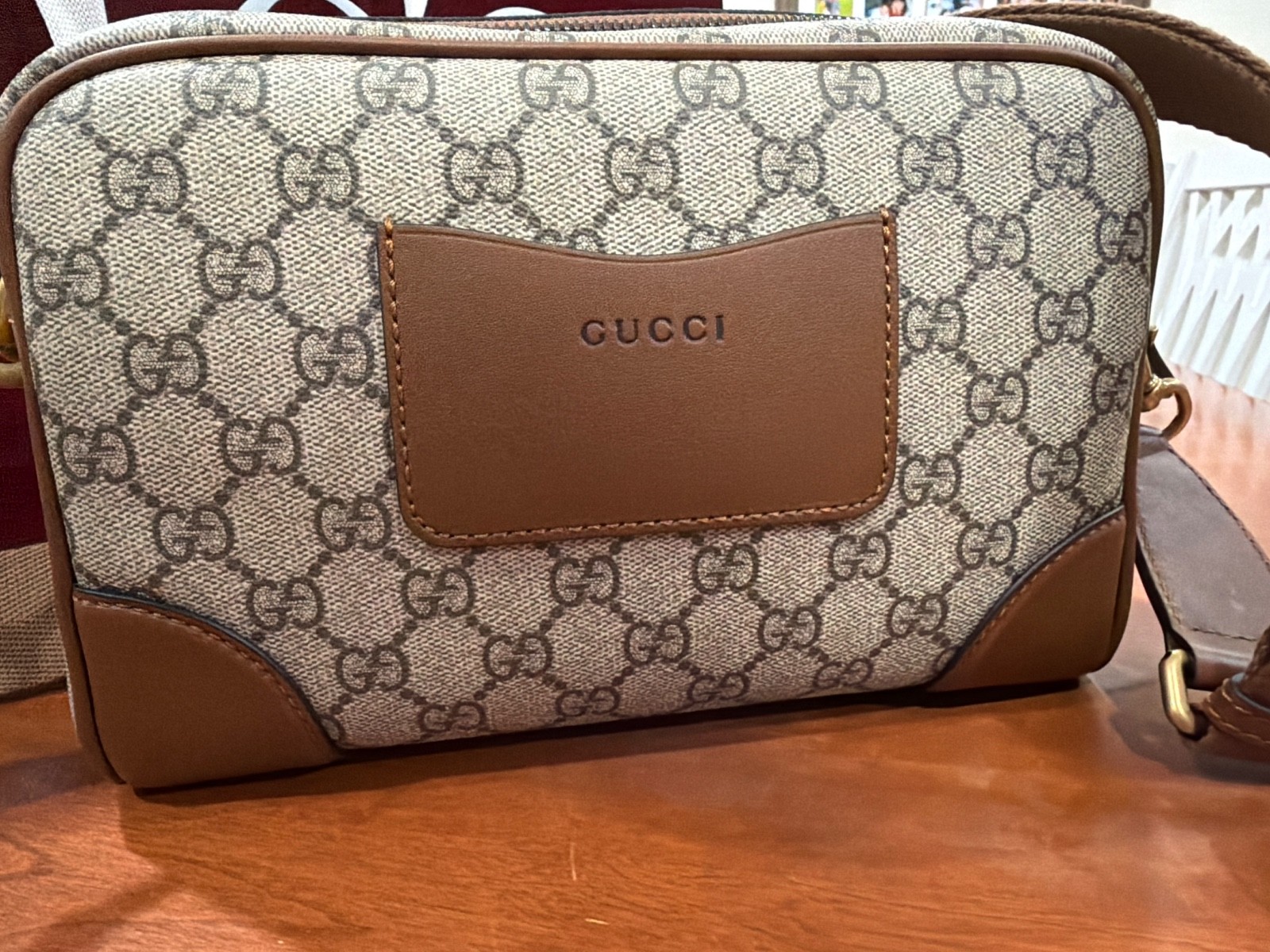 gucci mens gg emblem crossbody bag