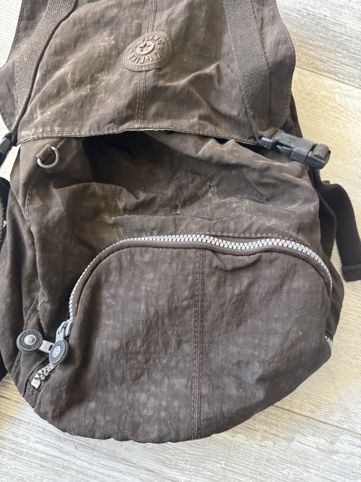 Kipling Brown Nylon Backpack Drawstring Flap Style with Front Zip Pocket & Logo