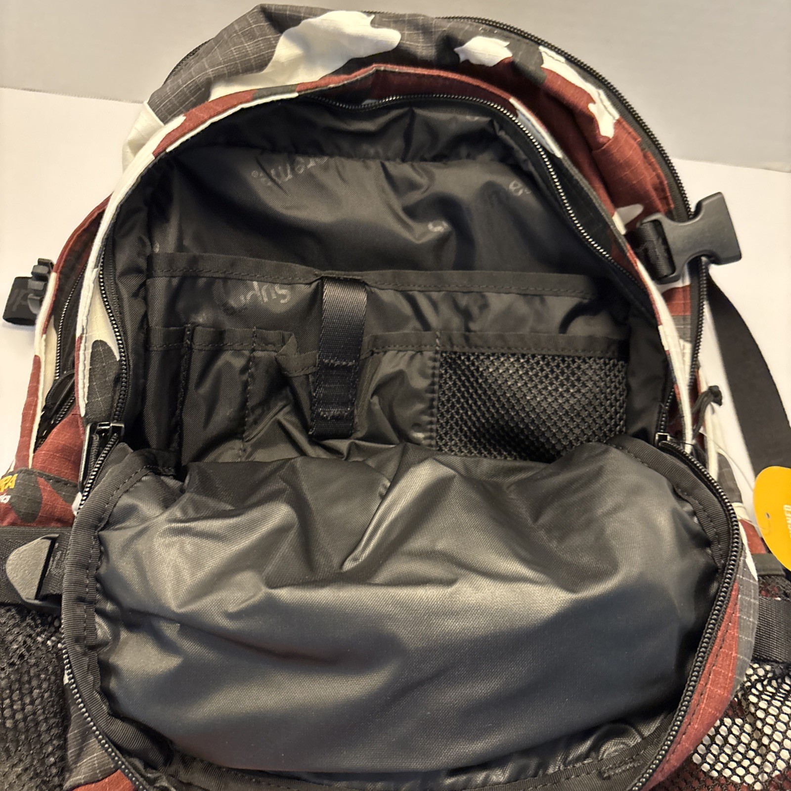 Supreme Logo Red Camo Backpack SS26