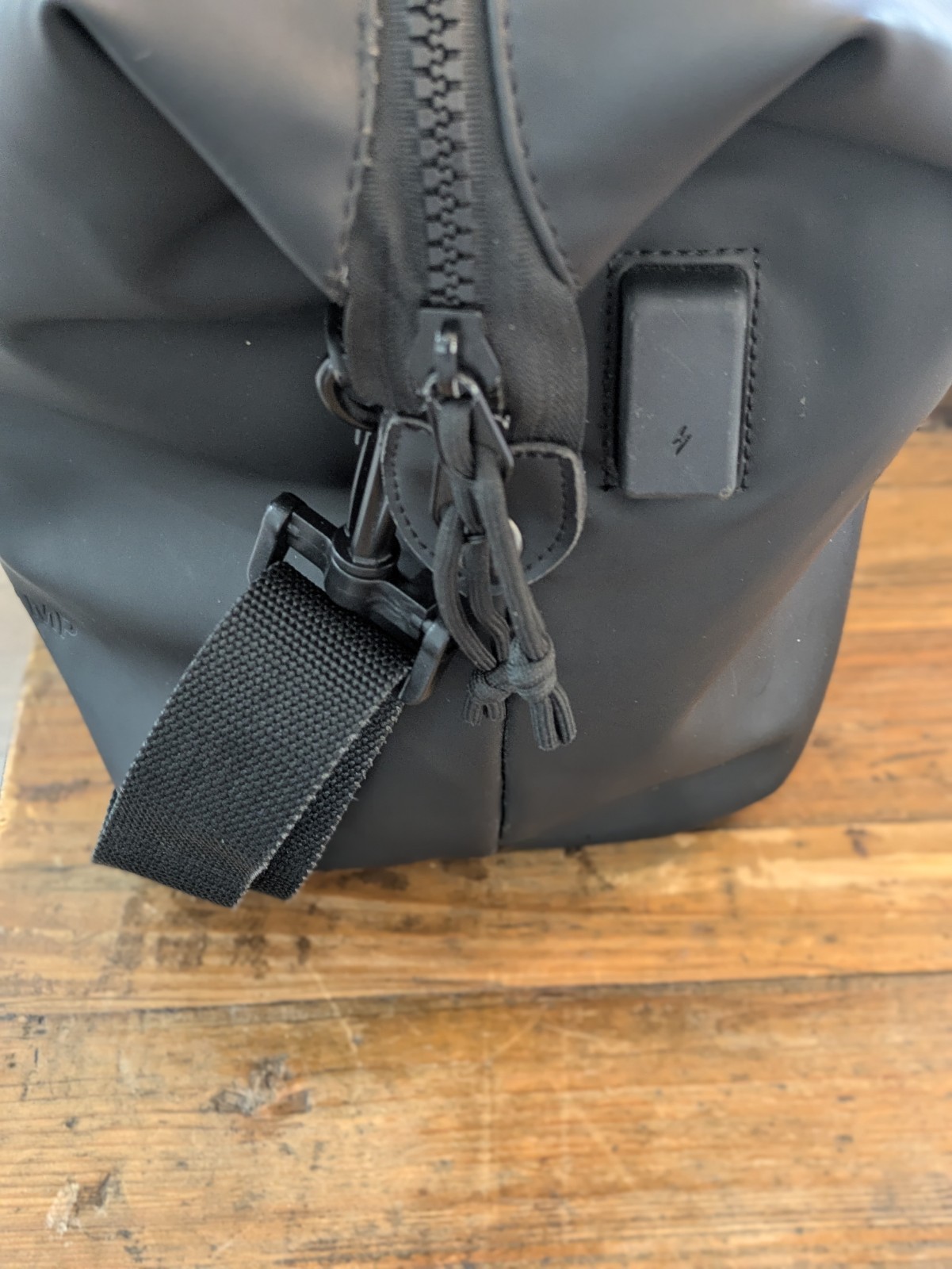 Duchamp London Rubberized Duffle Bag USB Cable Access in Black
