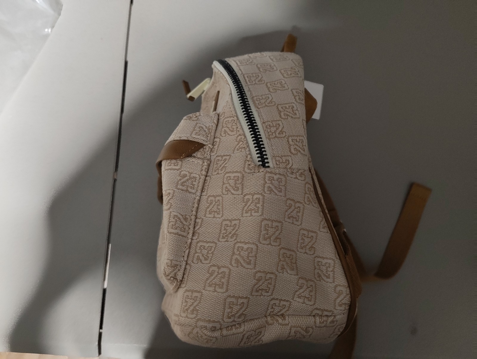Air Jordan Monogram Logo Jacquard Mini Backpack 8L Luxury Travel Bag Coconut