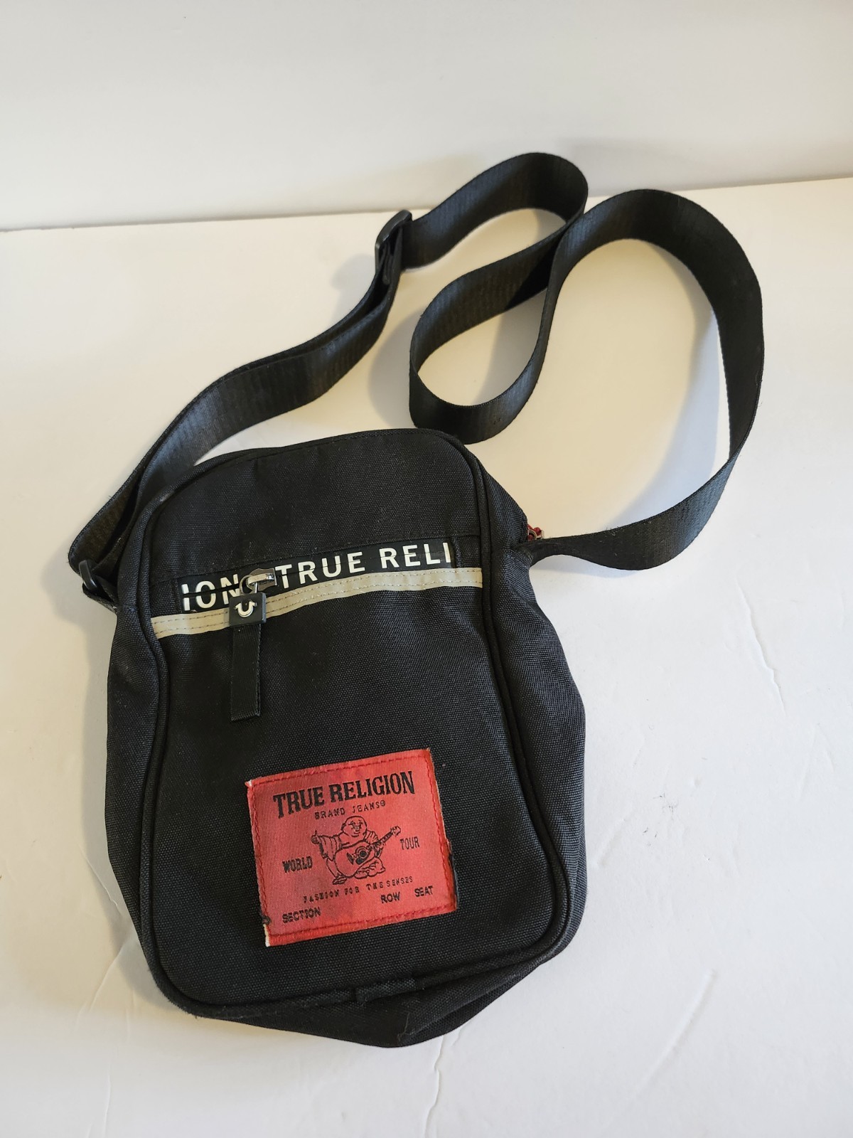 True Religion Black Messenger Bag Adjustable Strap Inner Pockets Buddha Logo