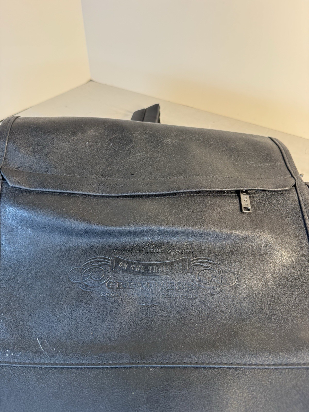 Solid Black leather messenger bag With Inside Pockets And Back Pack Handles