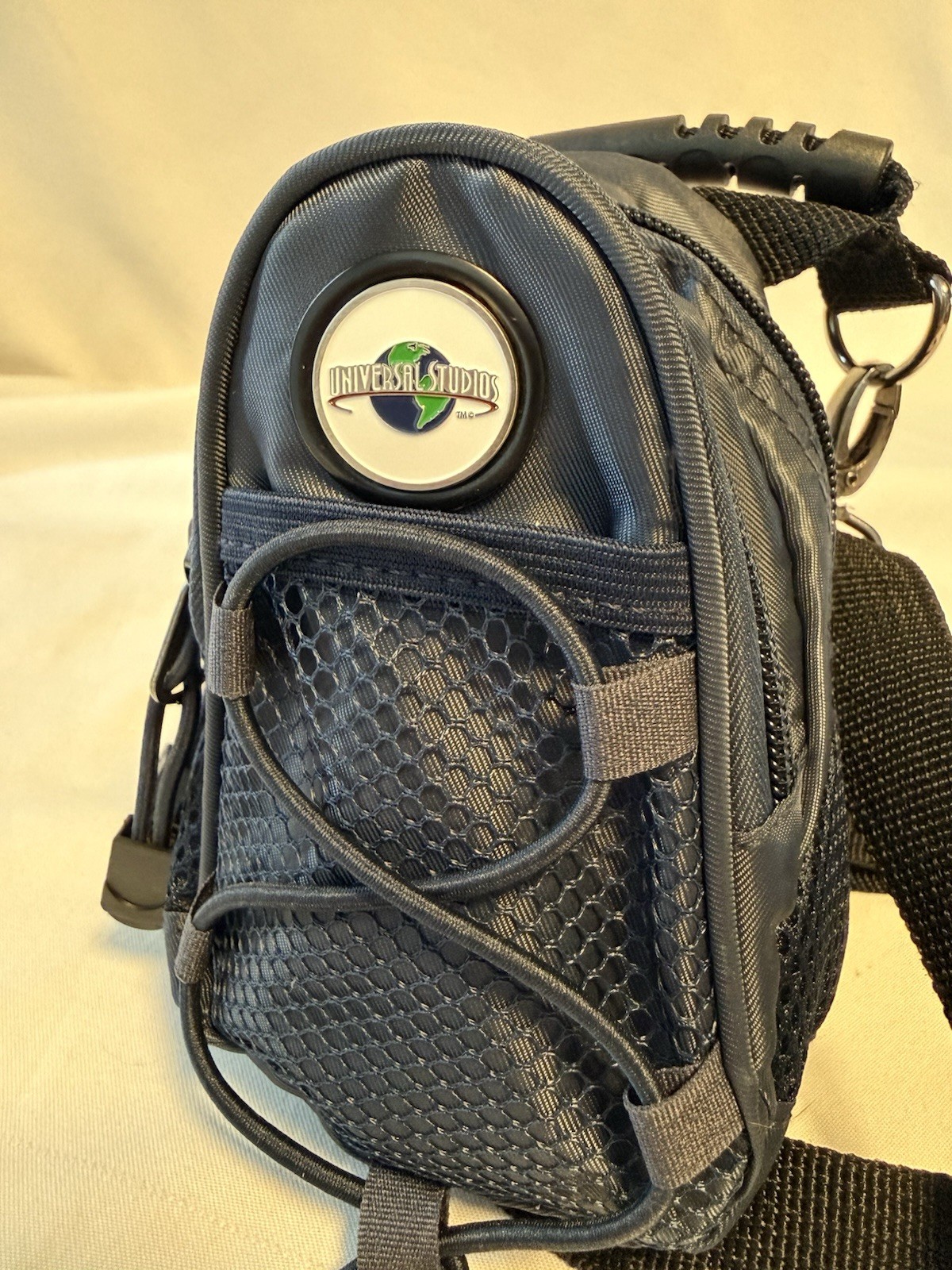 Universal Studios Navy Blue Mini Day Pack 7 X 5” Handle & Strap D Clip