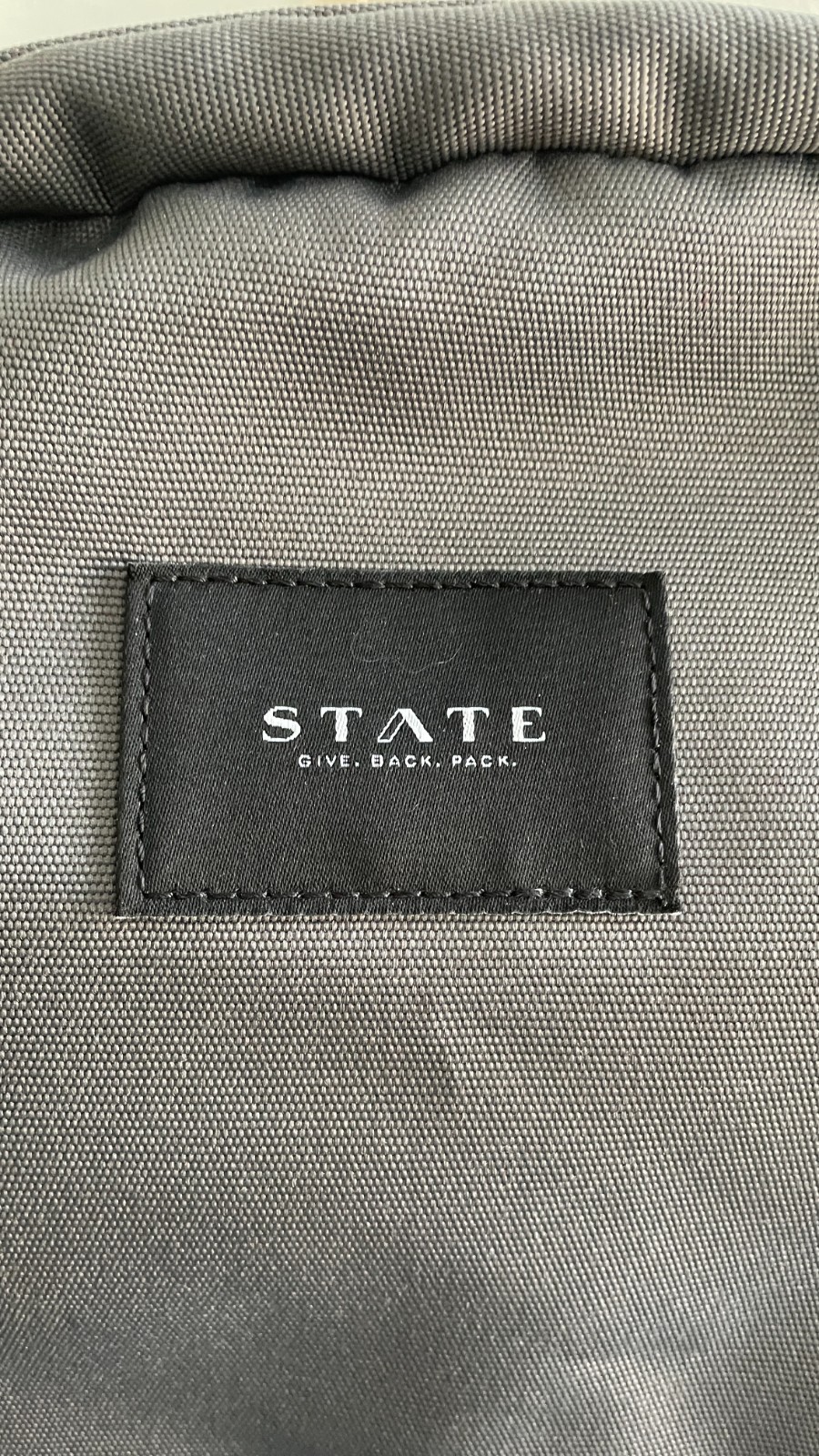 State Bags backpack dark gray padded laptop compartment