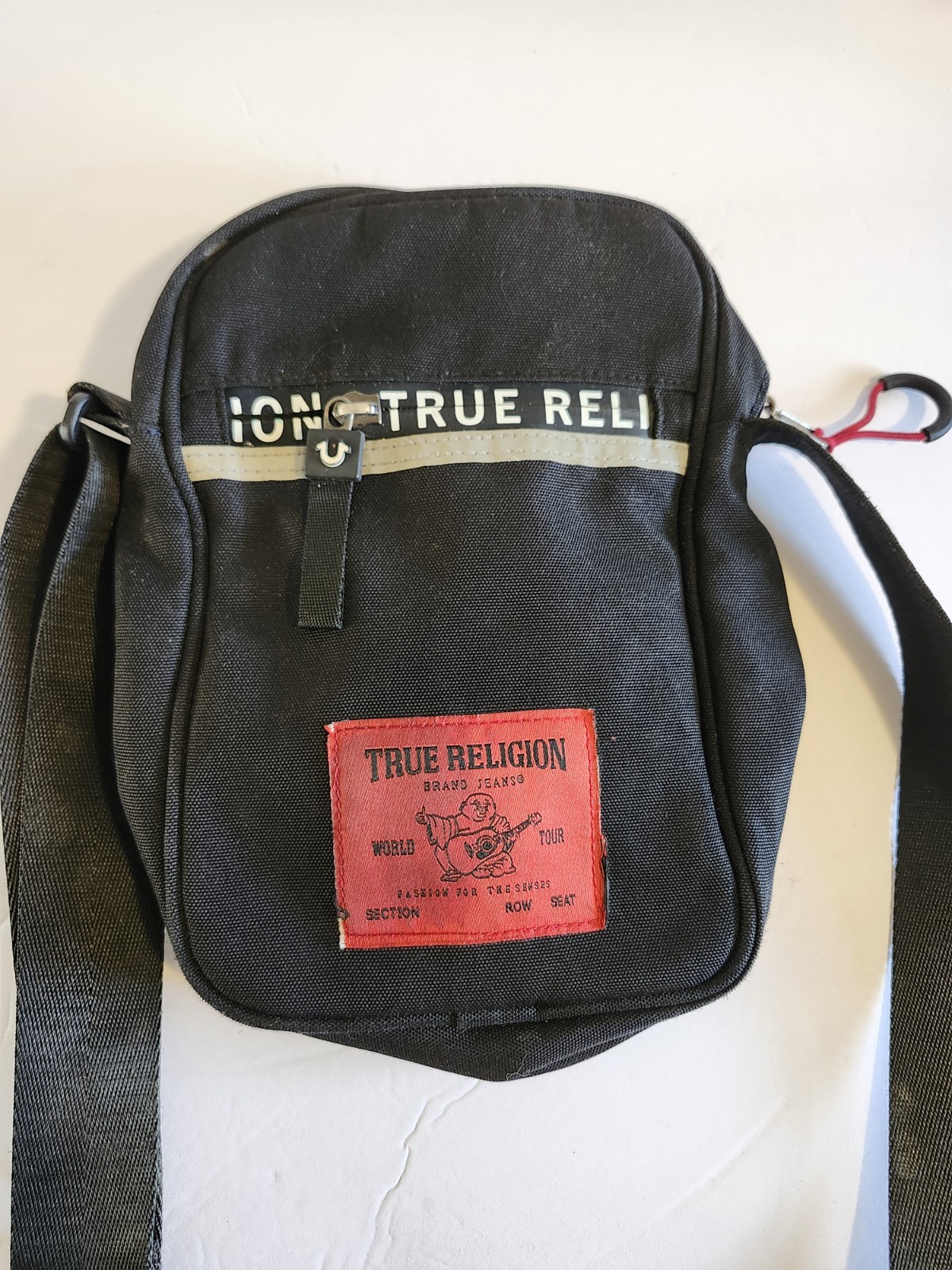 True Religion Black Messenger Bag Adjustable Strap Inner Pockets Buddha Logo