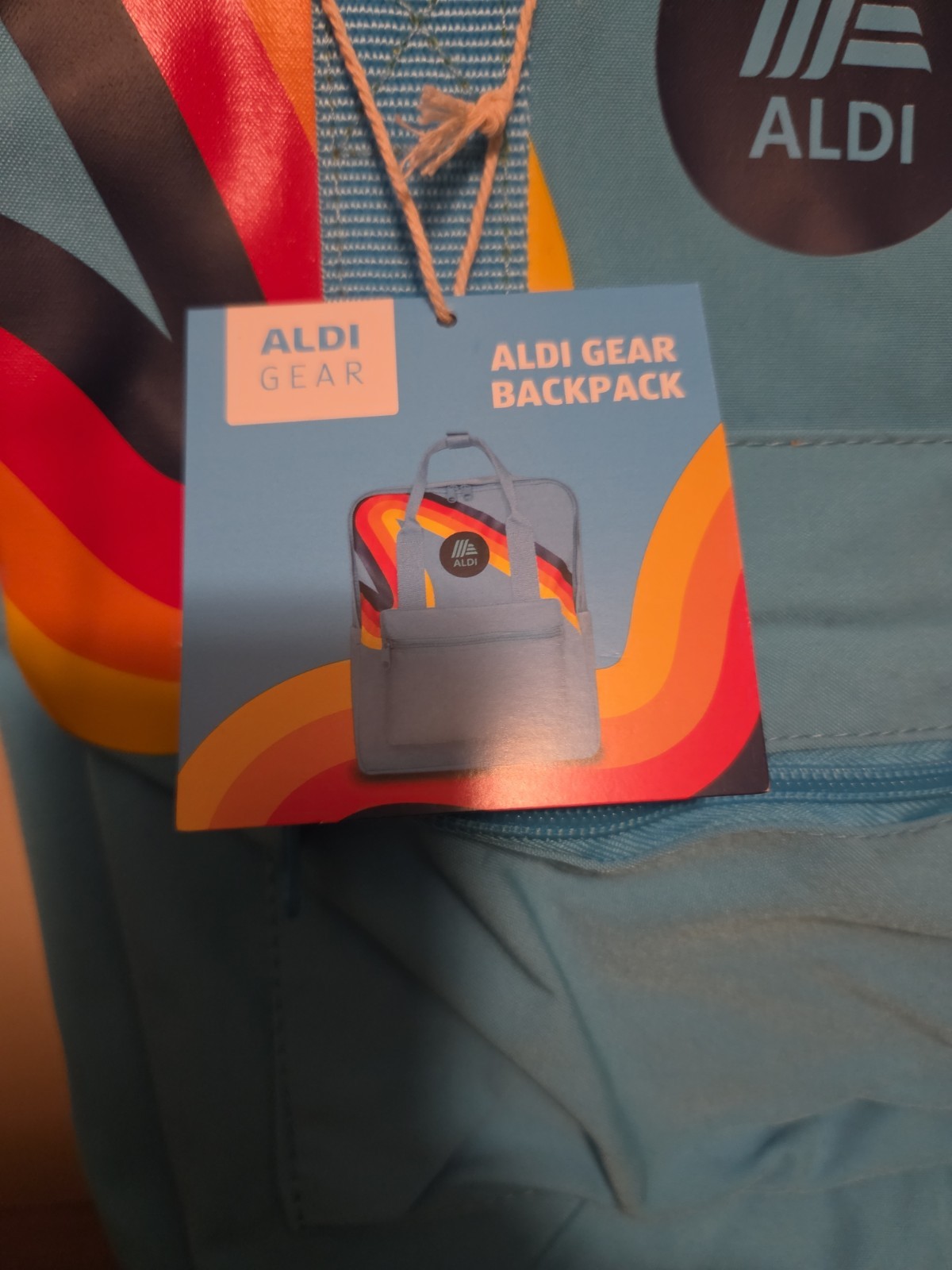 Aldi Gear Blue Rainbow Backpack with Laptop Sleeve Side Pockets Bright Logo NWT