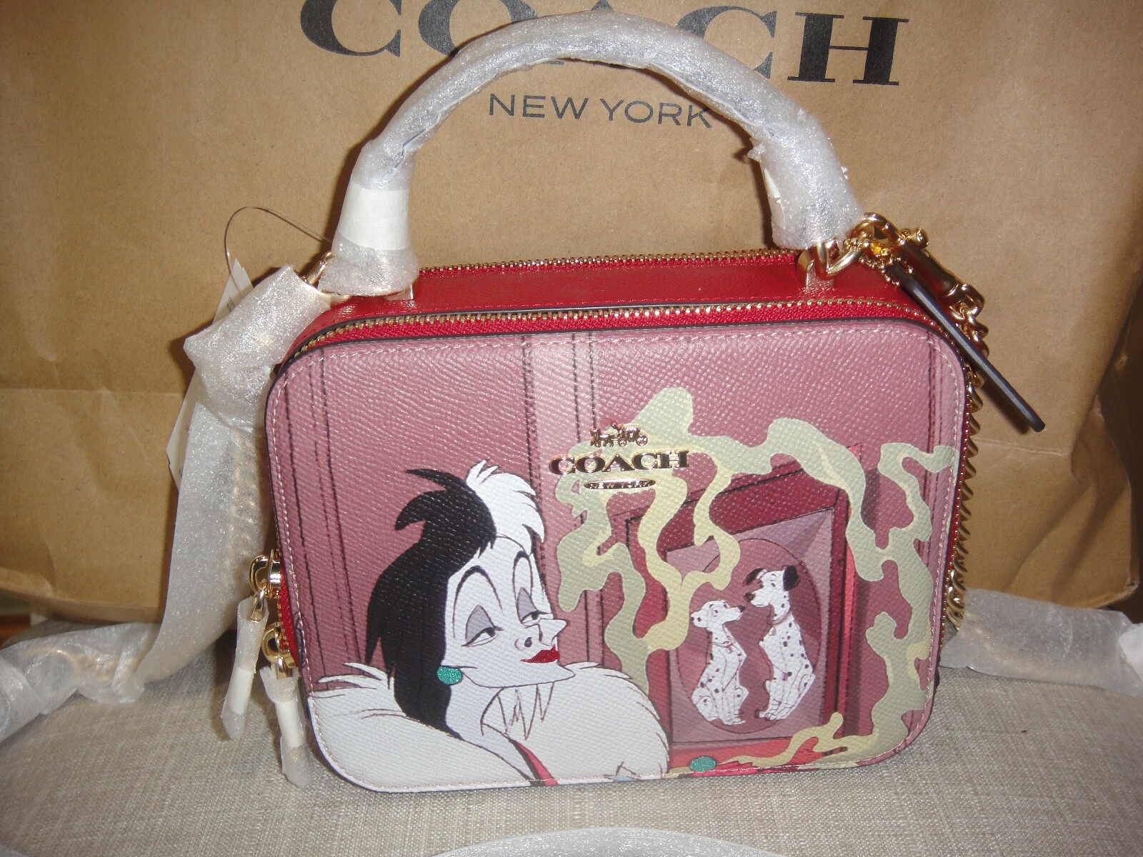 NEW COACH DISNEY CRUELA BOX APPLE MULTI CROSSBODY BAG.$398.00.MSRP 100%Authentic