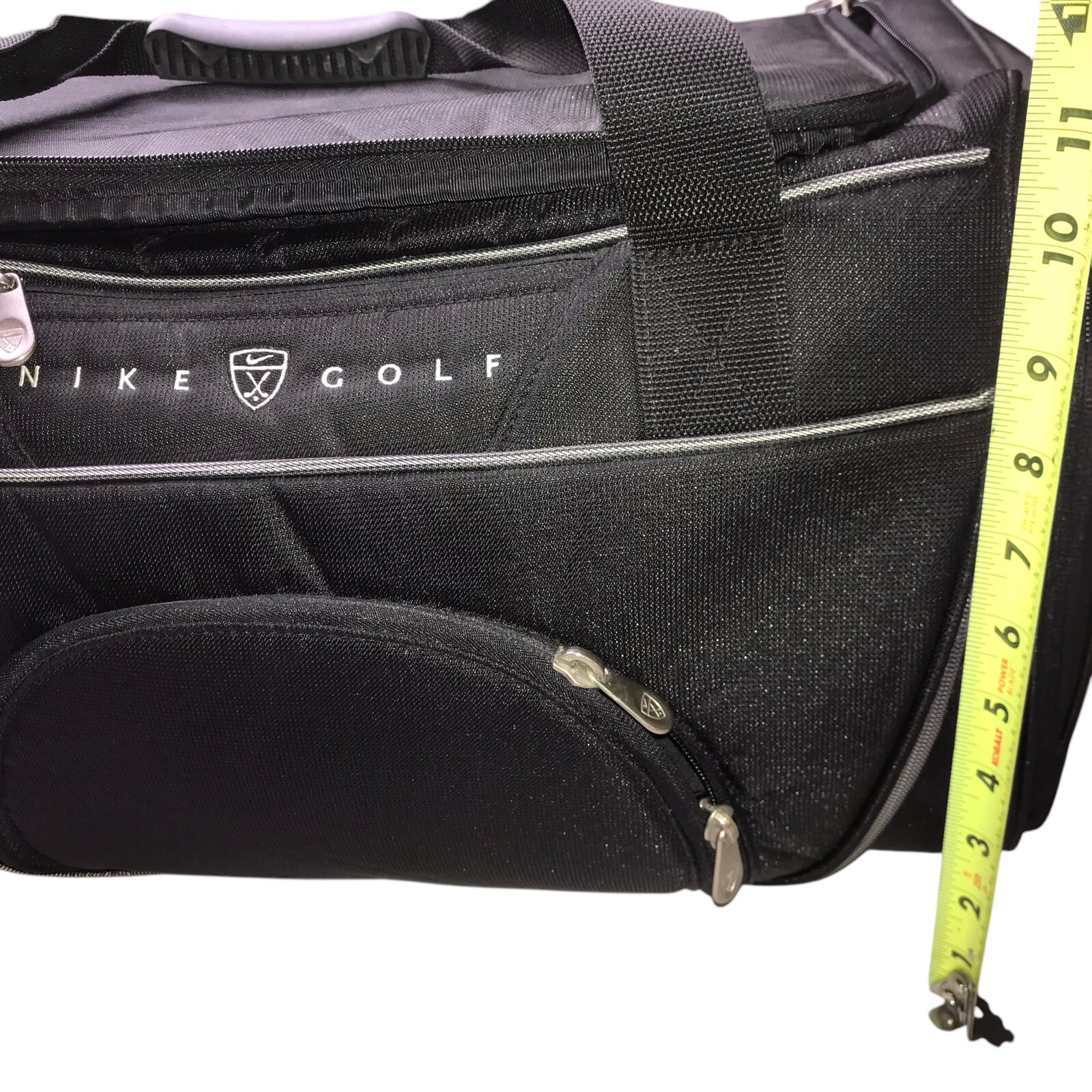 NIKE Golf Bag, Black. Duffle, Gym, Workout. Includes carrying strap. Pockets