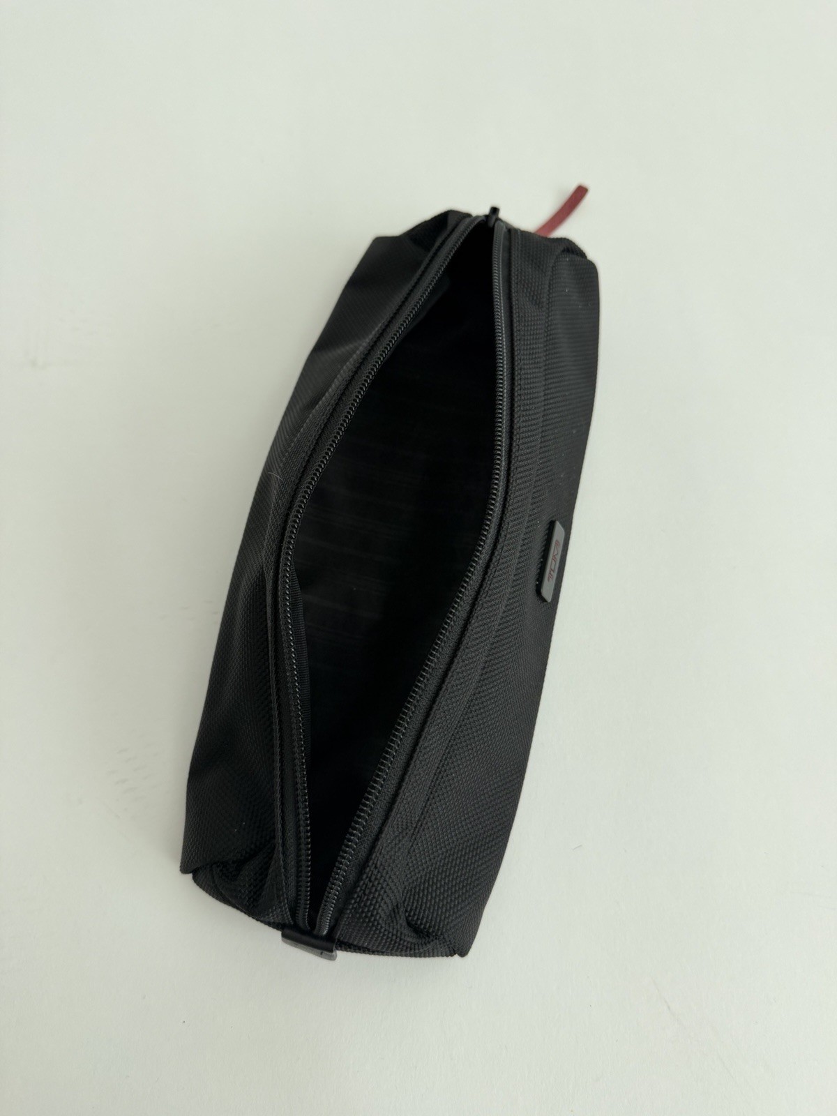 Tumi Alpha Electronic Cord Pouch in black ballistic nylon Travel Accessories