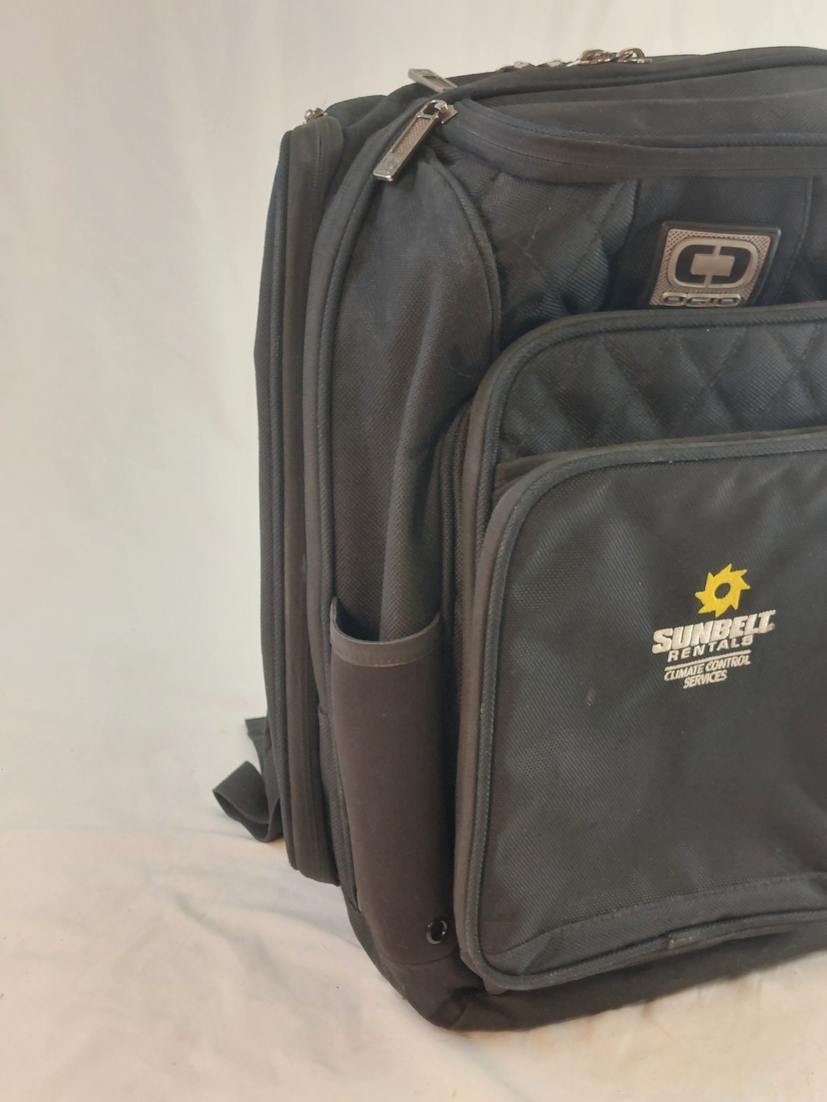 OGIO Epic Pack Backpack In Black Quilted sunbelt logo