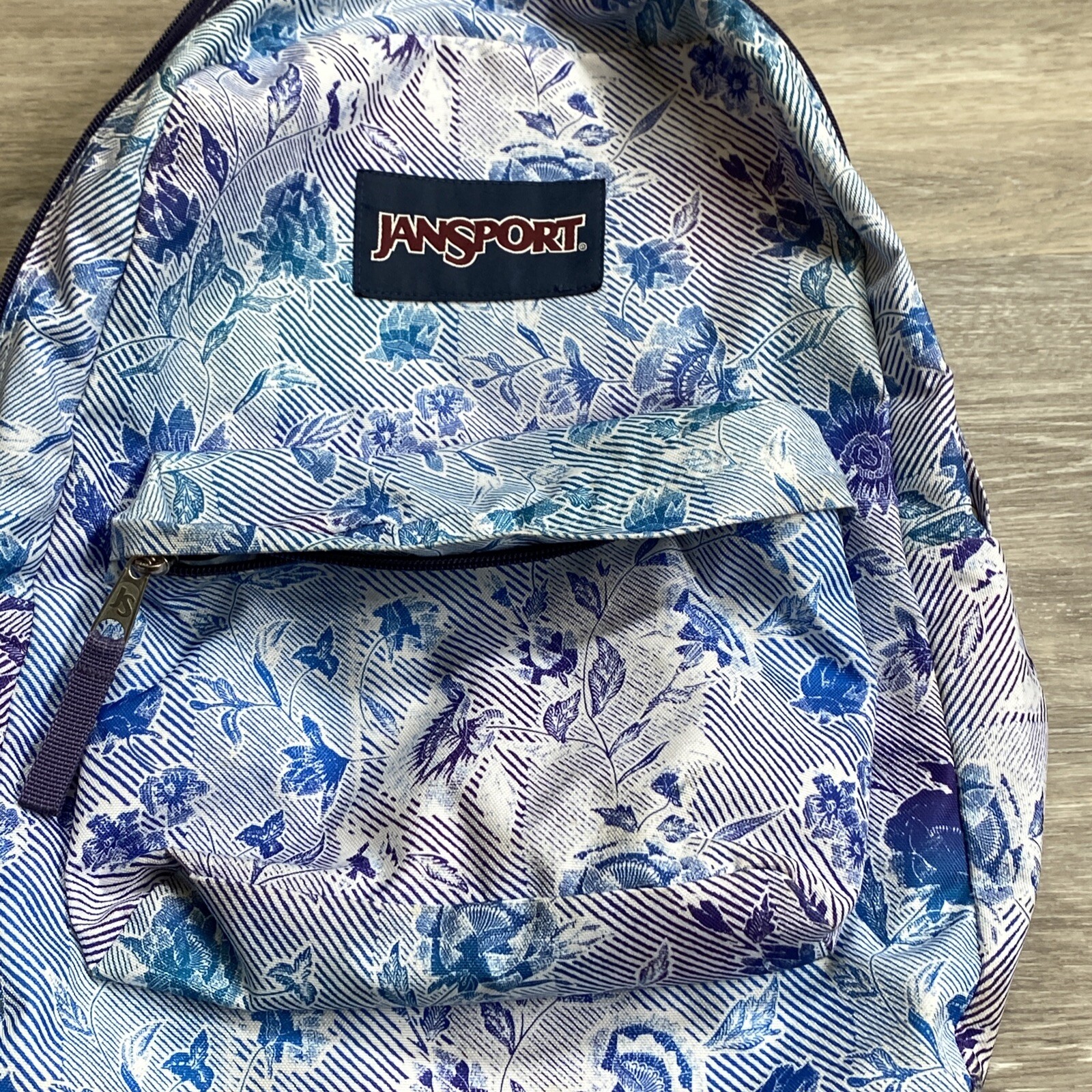 JanSport Superbreak backpack striped floral purple blue green