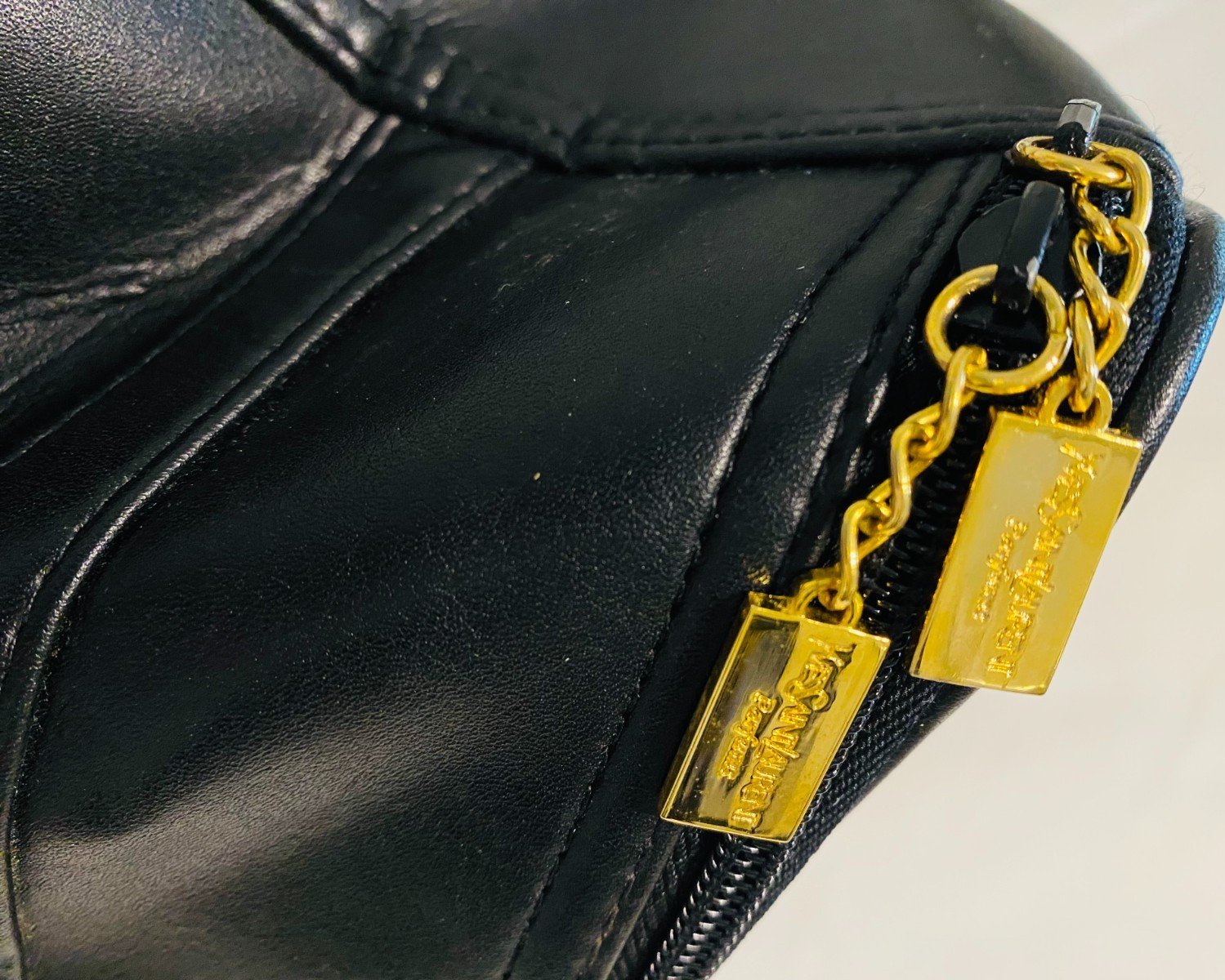 YSL YVES SAINT LAURENT Parfums black faux leather pouch toiletry bag Logo Charm