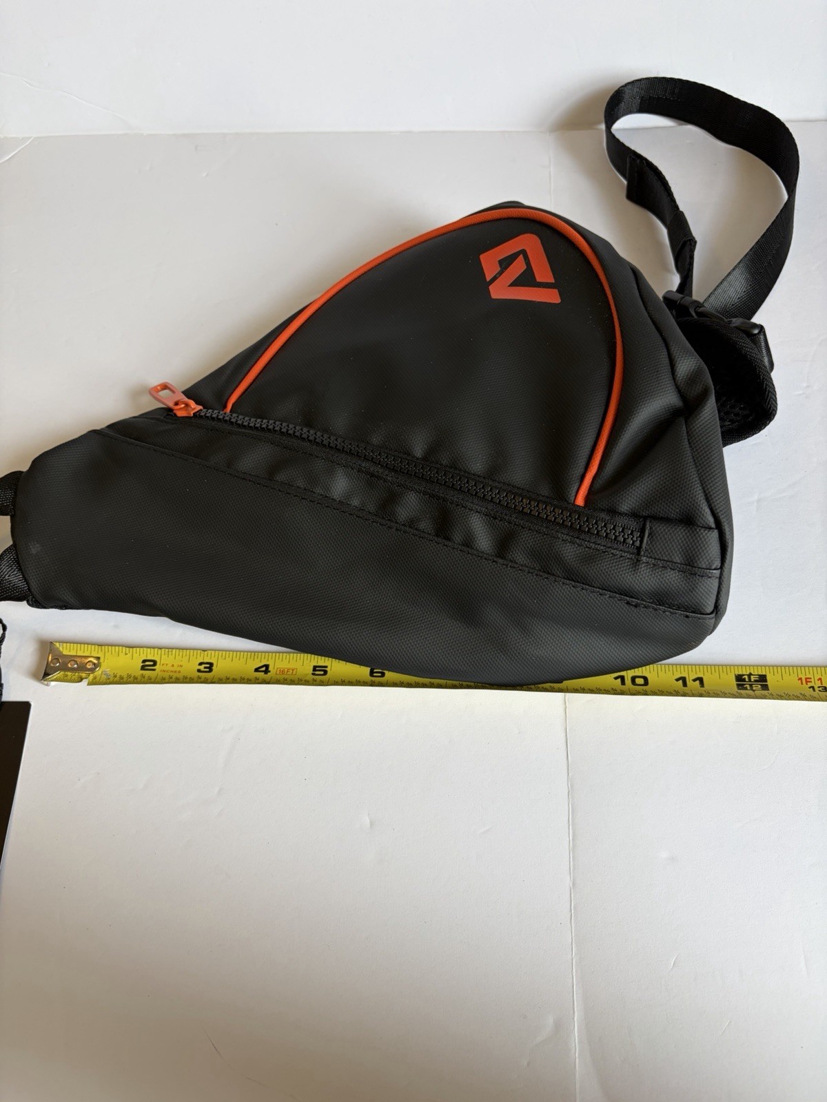 ATLEY JAMES black sling backpack