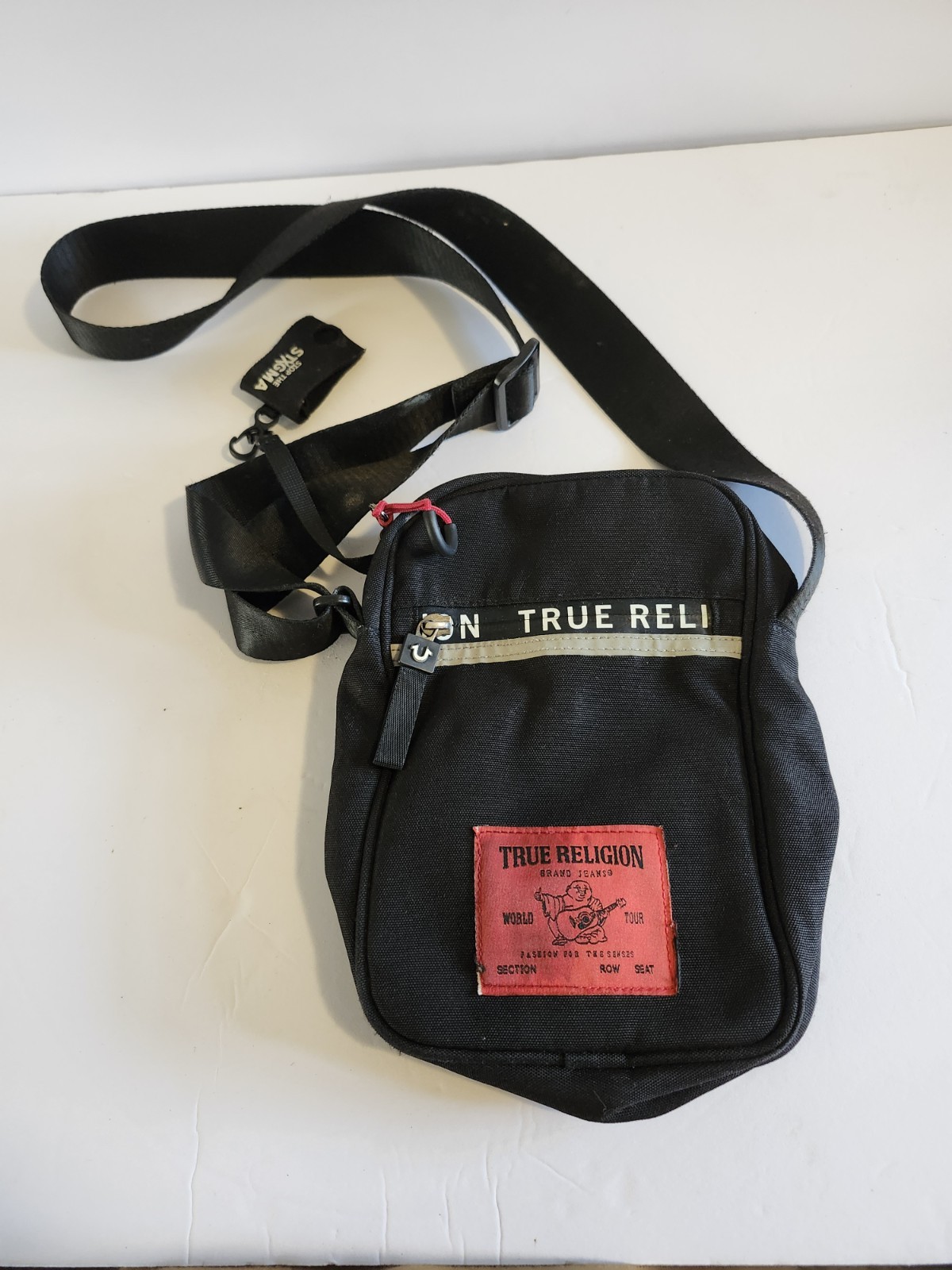 True Religion Black Messenger Bag Adjustable Strap Inner Pockets Buddha Logo
