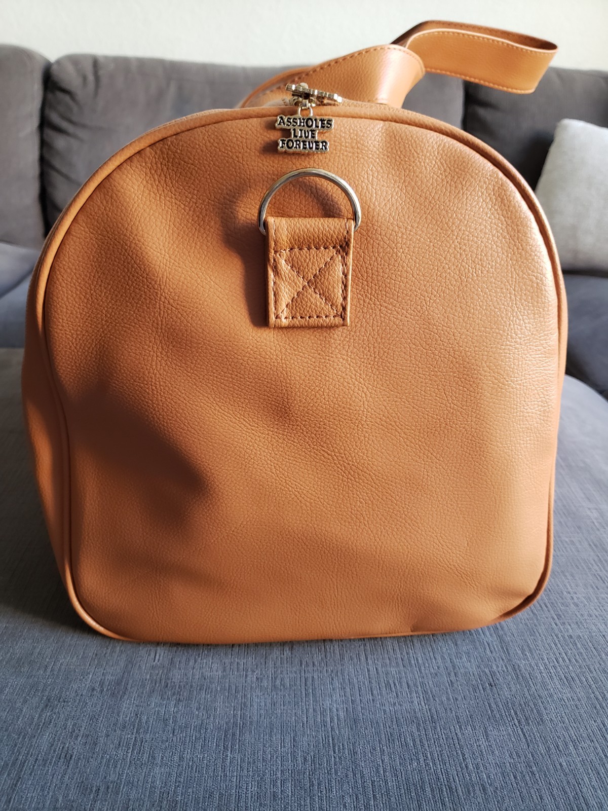 ASSHOLES*S LIVE FOREVER – Emotional Baggage Camel Tan Faux Leather BRAND NEW!