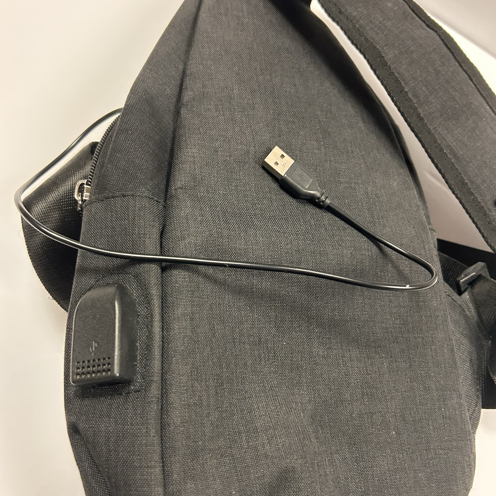 Nupouch One Strap Antitheft Black Sling Backpack with USB Charging Cable