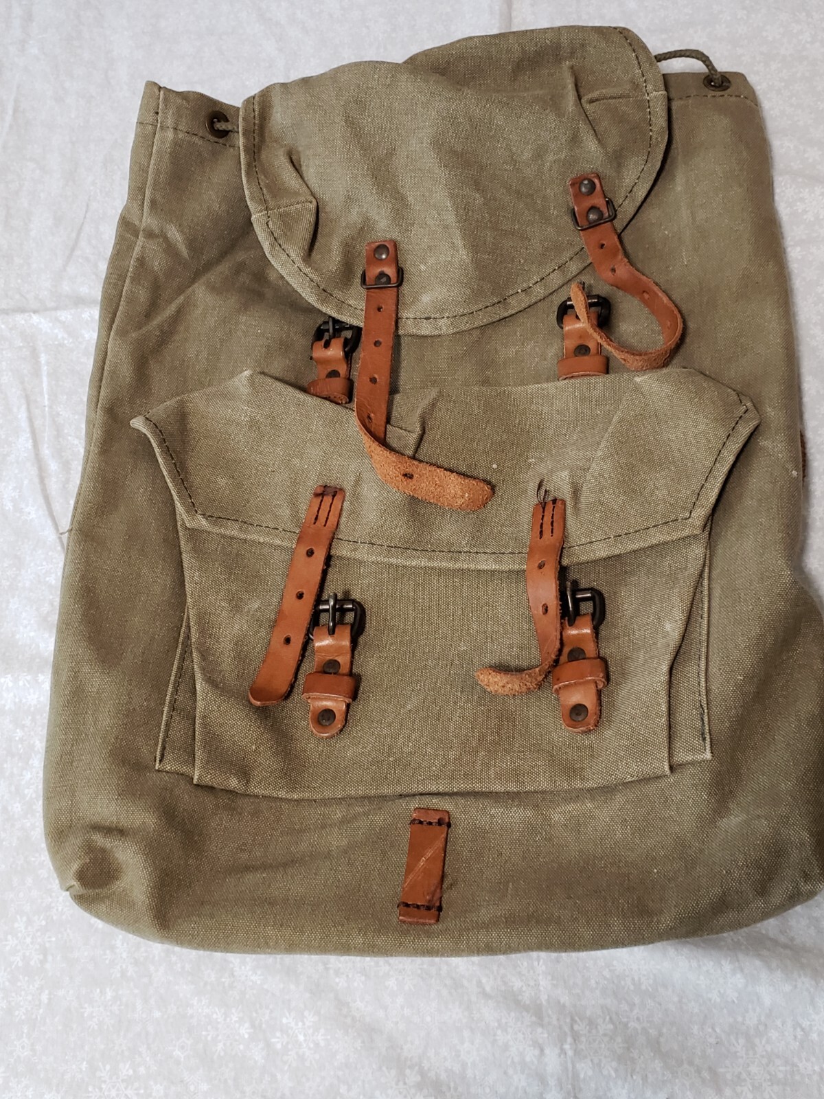 The J Peterman Company Vintage Leather & Canvas Backpack for Travelers