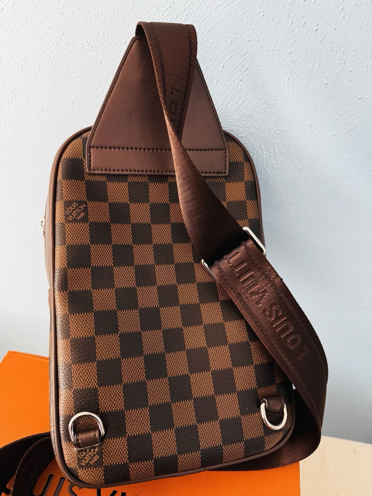 Louis Vuitton Brown Crossbody Sling Bag with Zip Closure
