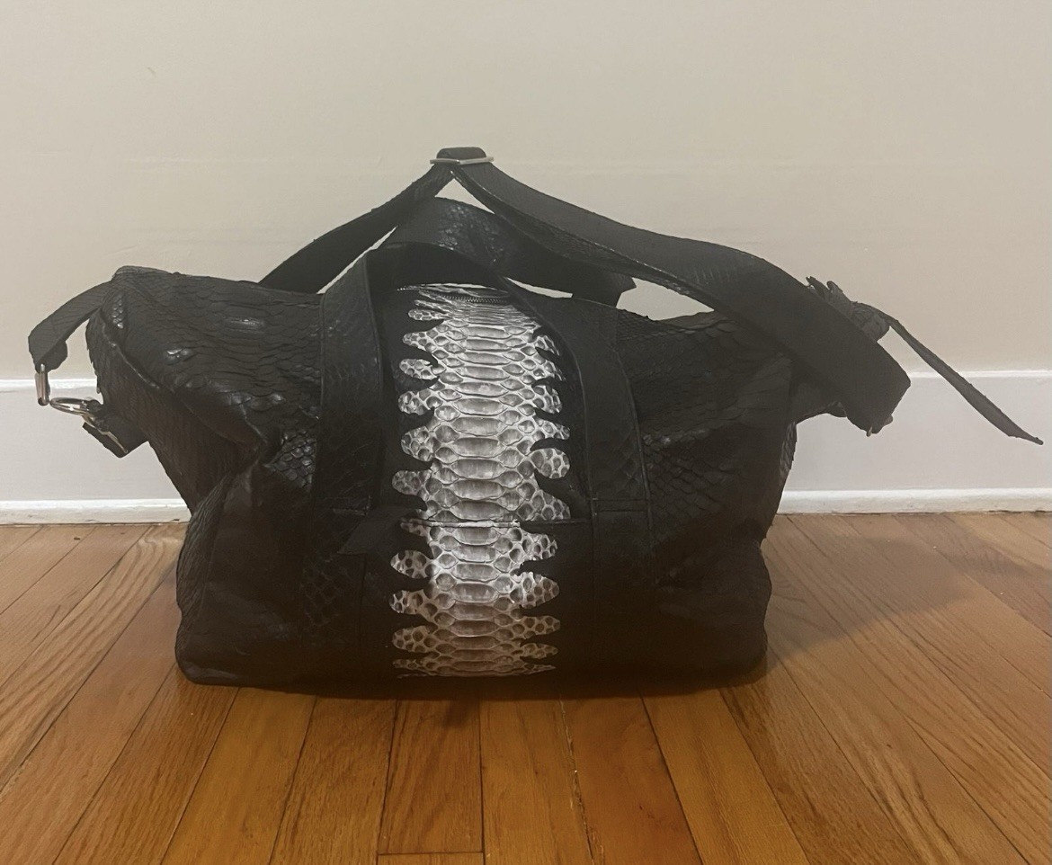 Cool and stylish Python Duffle Bag. 100% real python leather. Unisex.