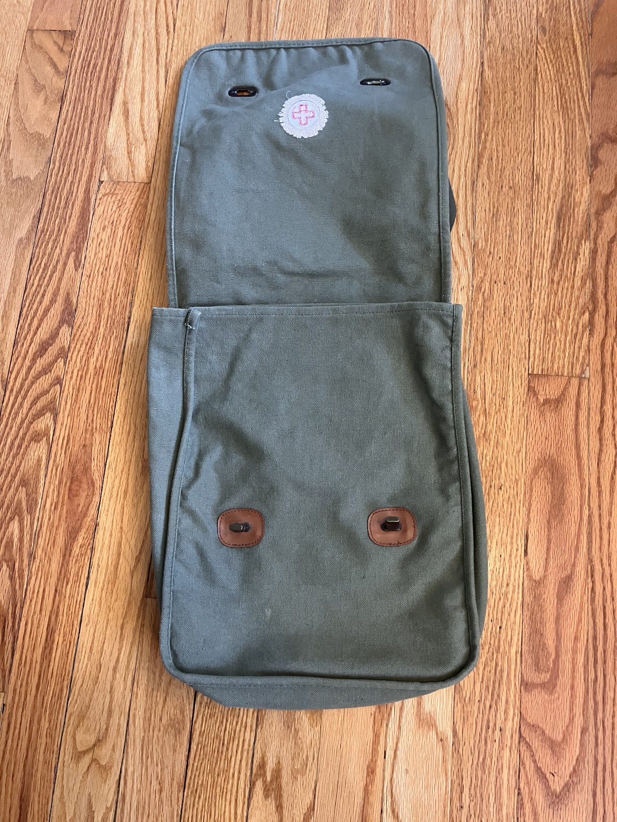 Olive green field bag – good condition – interior pouch with working zipper