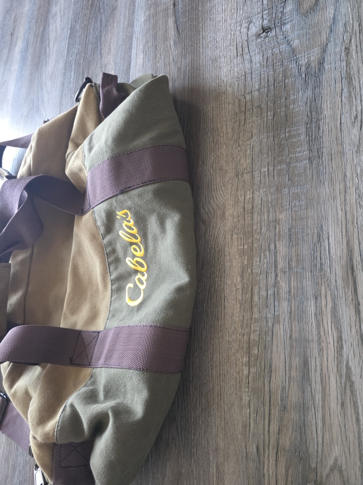 Cabela’s Men’s Two-Tone Canvas Duffel Bag in Tan/Olive