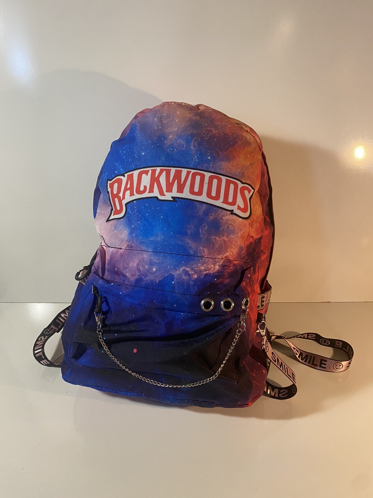 Backwoods Cigars Trippy Outer Space Smile Trim Adjustable Multicolor Backpack