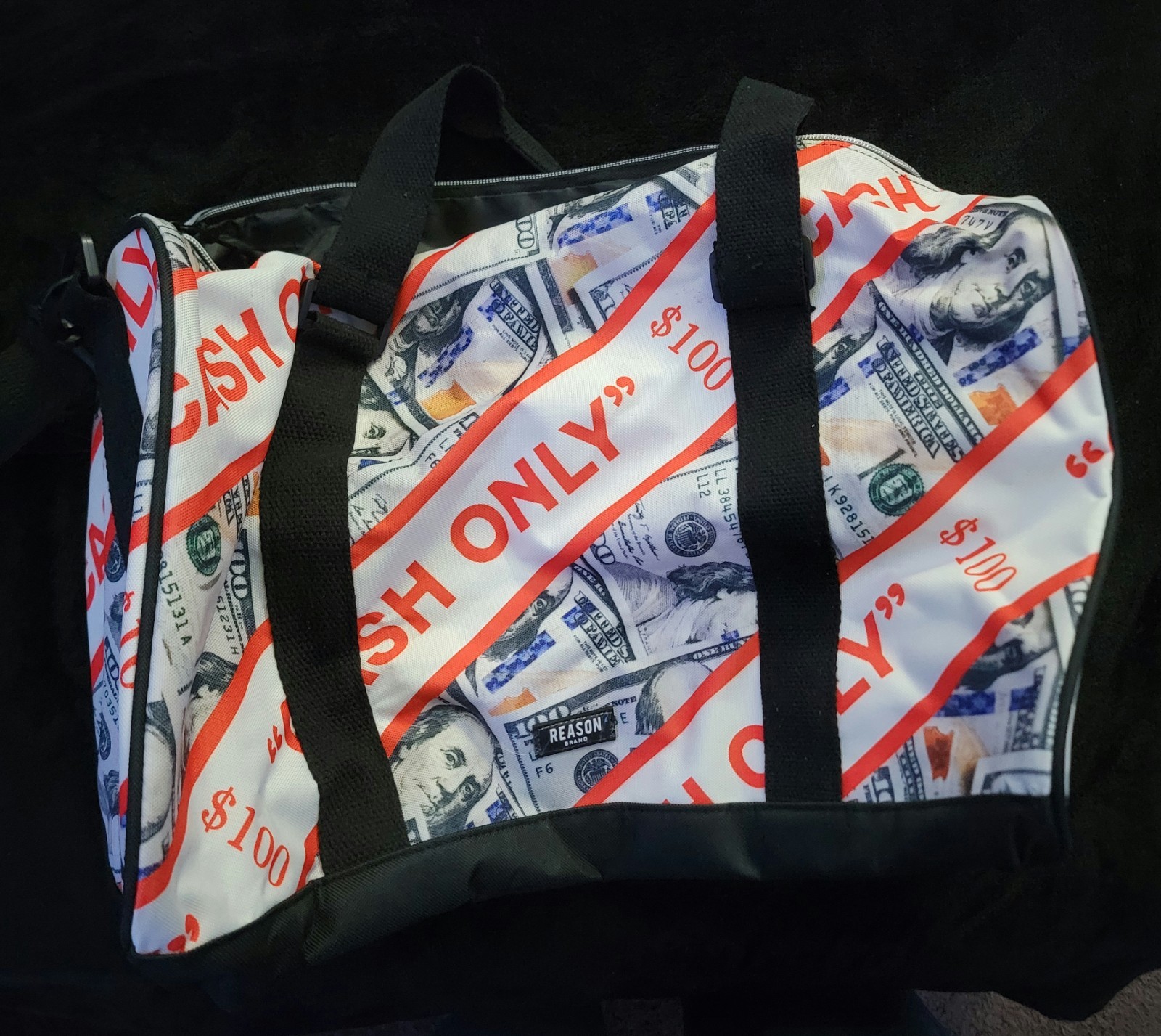 Cash Only Design Duffel Bag by Reason