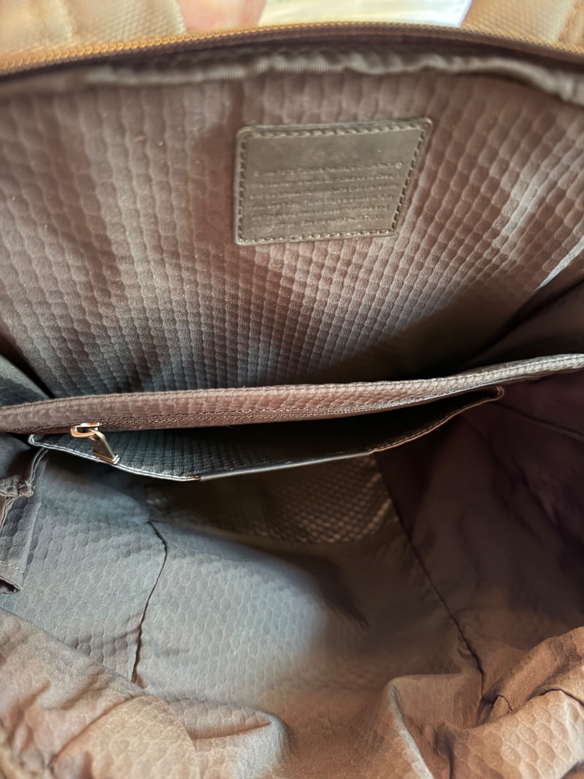 tumi backpack gray and black – has a couple of marks shown in pictures