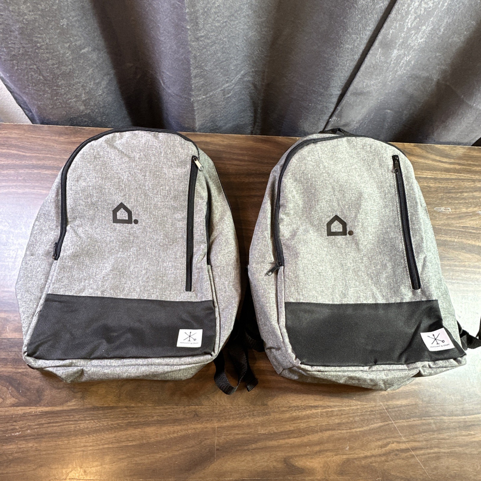 Lot Of 2 Leeds backpacks, One side pocket for a thin water bottle 3 zippered