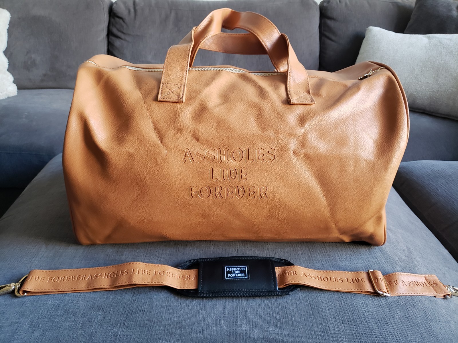 ASSHOLES*S LIVE FOREVER – Emotional Baggage Camel Tan Faux Leather BRAND NEW!