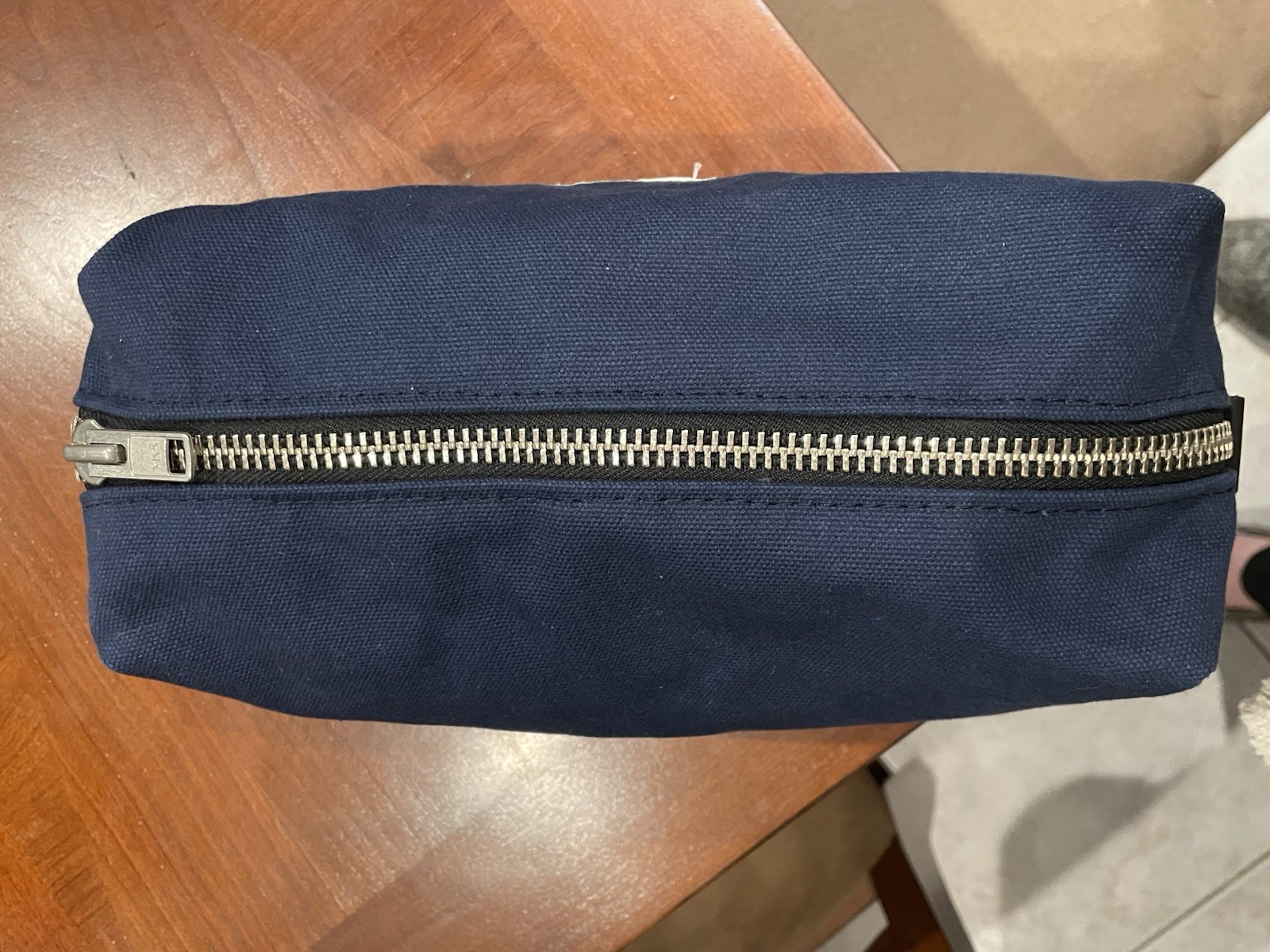 Steele Canvas Dopp Kit. Navy Blue Waxed Canvas With Sesame Workshop Logo. USA.