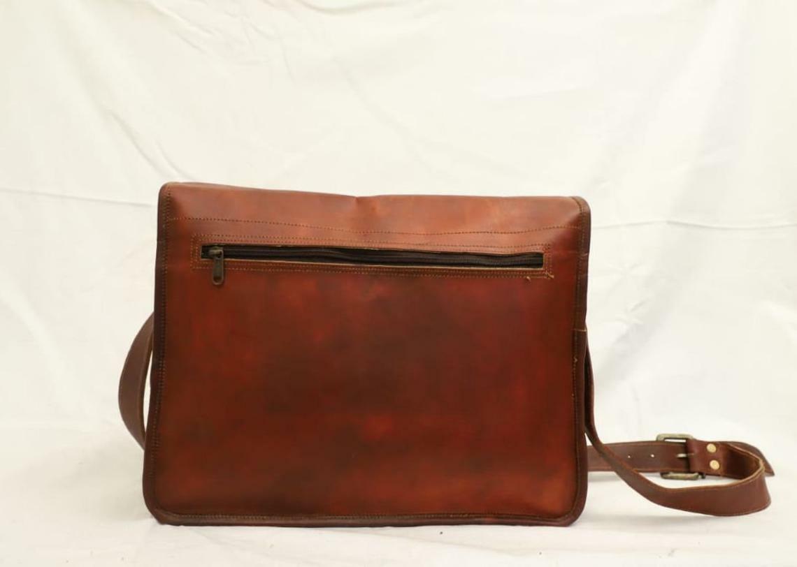 Leather Bag Designed to carry mini laptops, tab, documents personal belonging.