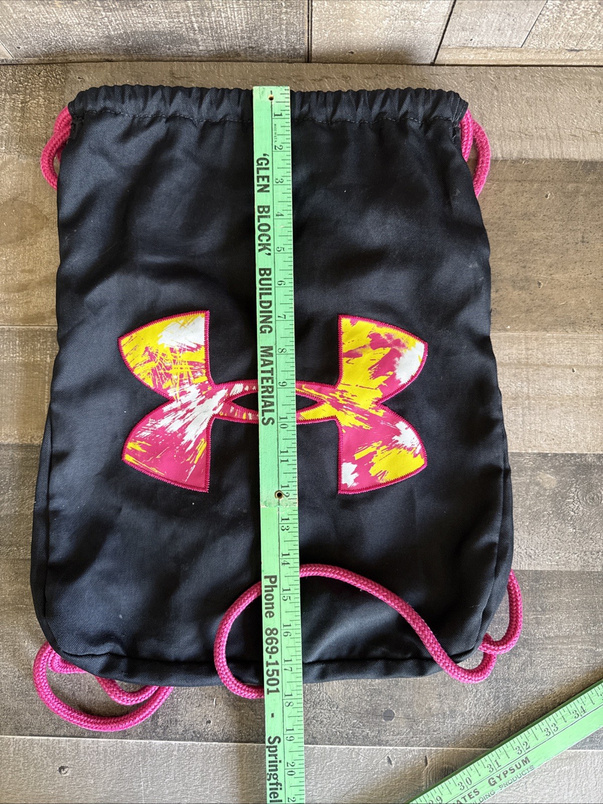 Pre- owned Black Under Armour Draw String Gym Bag with Pink and Yellow logo