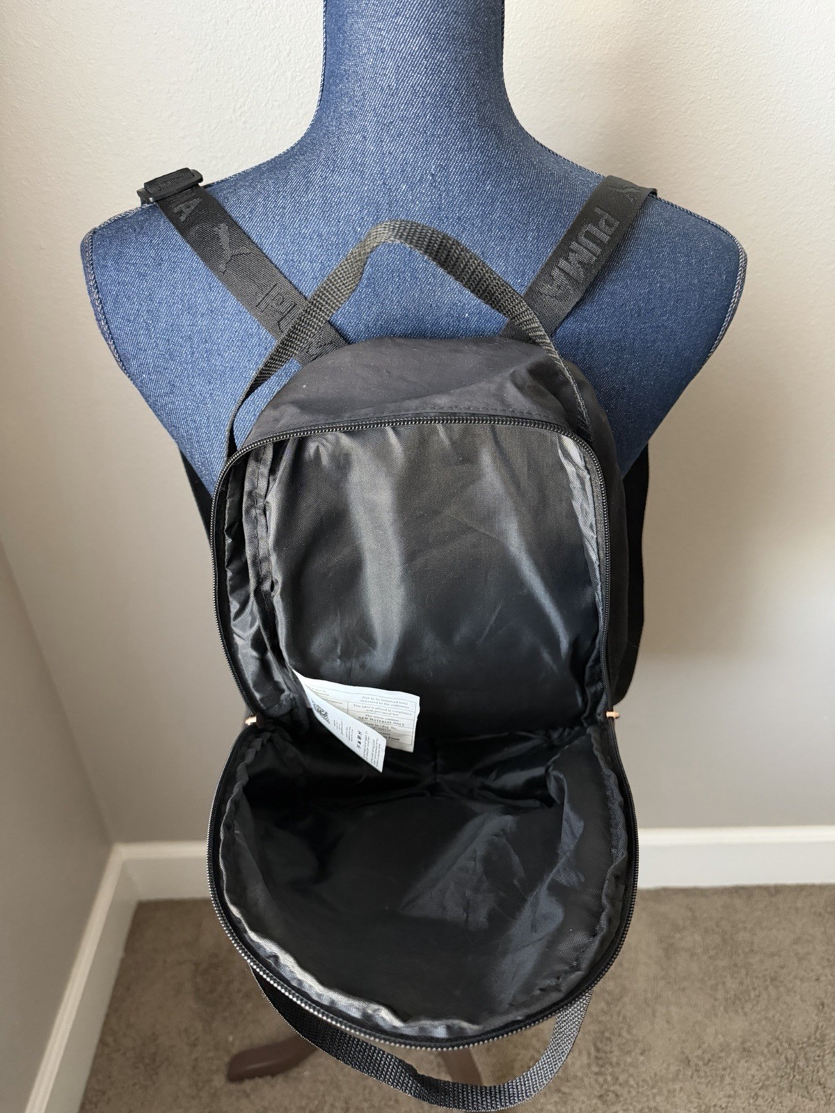 small black puma backpack w/ rose gold hardware