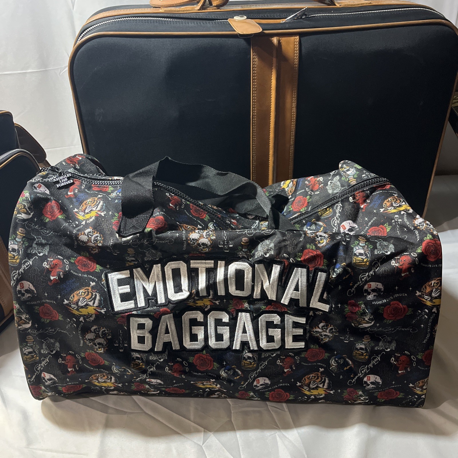 A**holes Live Forever Emotional Baggage Duffel Bag Skull Bottle All-Over Print