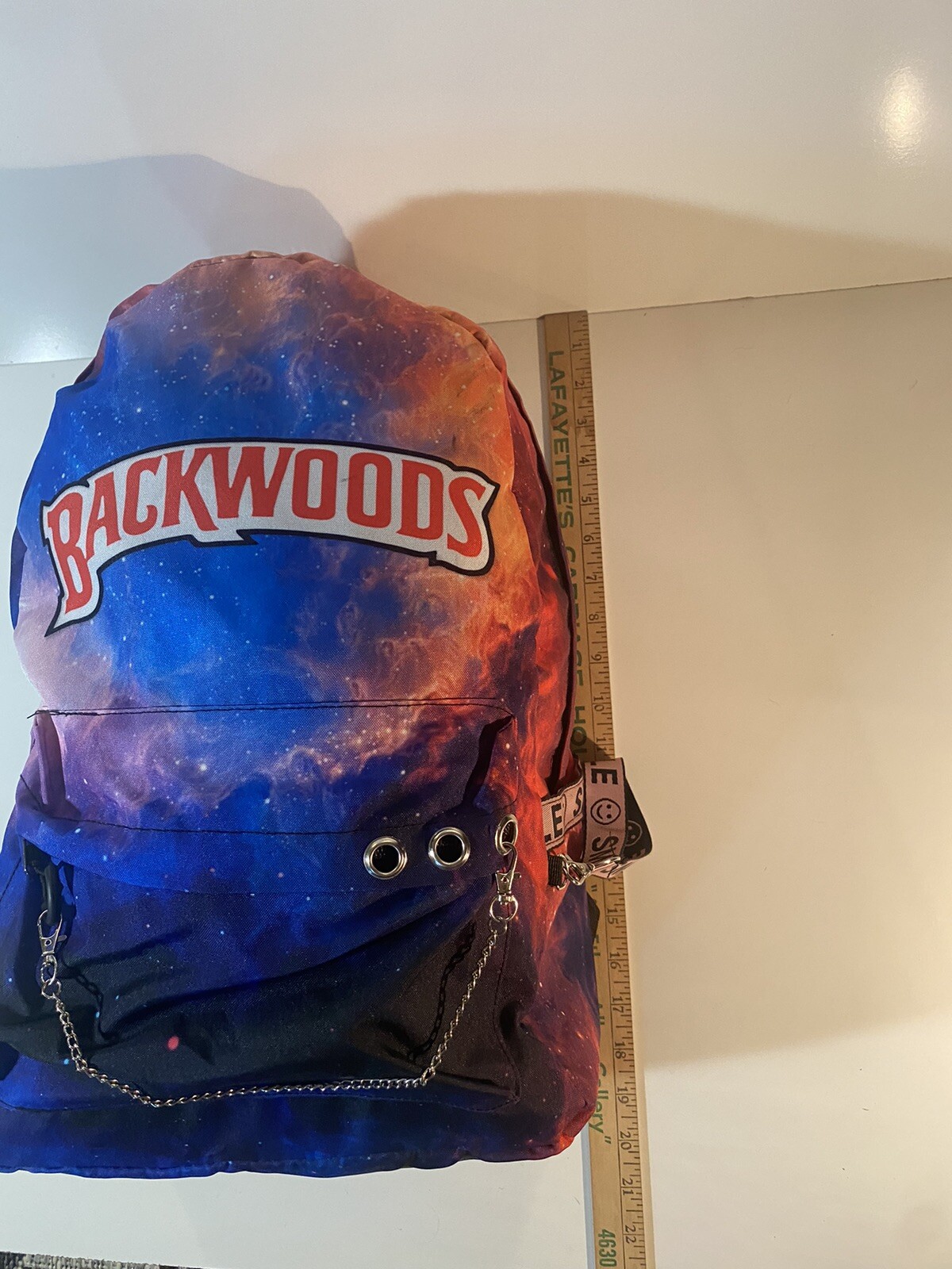 Backwoods Cigars Trippy Outer Space Smile Trim Adjustable Multicolor Backpack