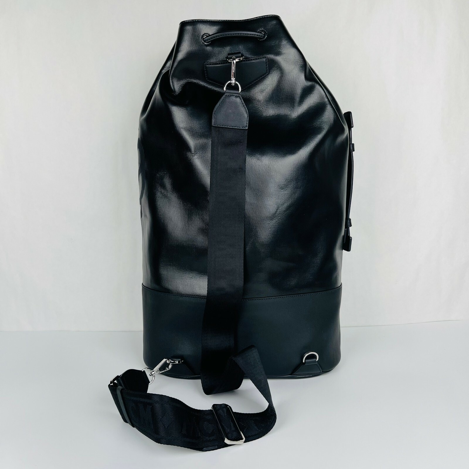 with tags $1120 MCM Tivitat Black Coated Canvas Large Drawstring Backp G1N