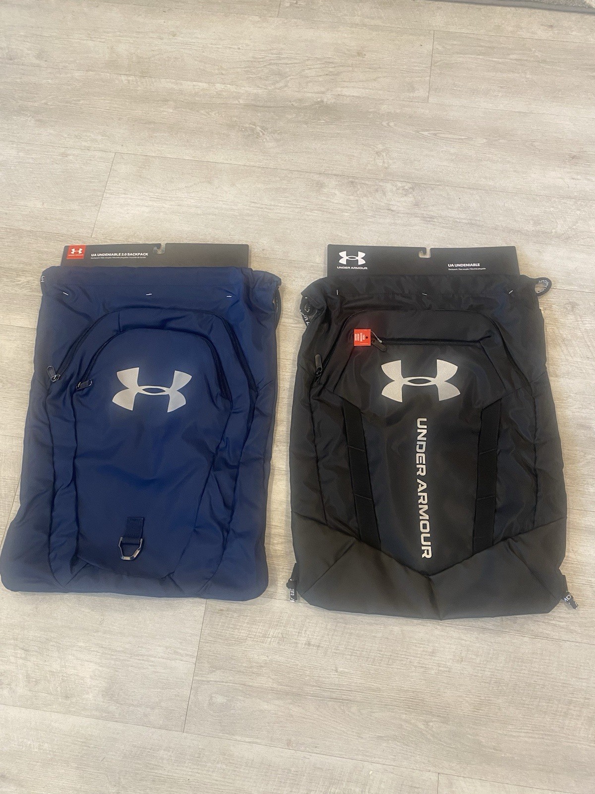 Under Armour Undeniable And Undeniable 2 Sack packs. Black And Blue Lot Of 2