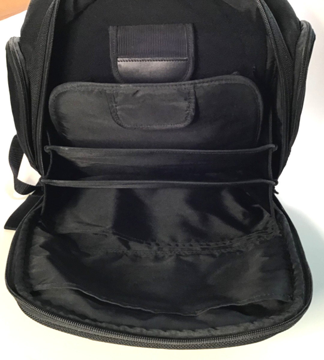 BRIGGS & RILEY BLACK CANVAS BACK PACK – 15X16 OD DIAMETER – MULTI COMPARTMENT