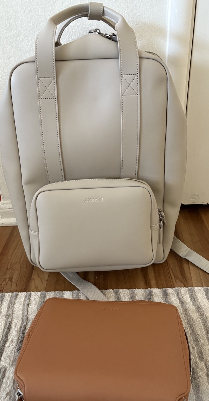 Monos Metro Backpack in Ivory And Folio Kit Organizer Cognac Vegan