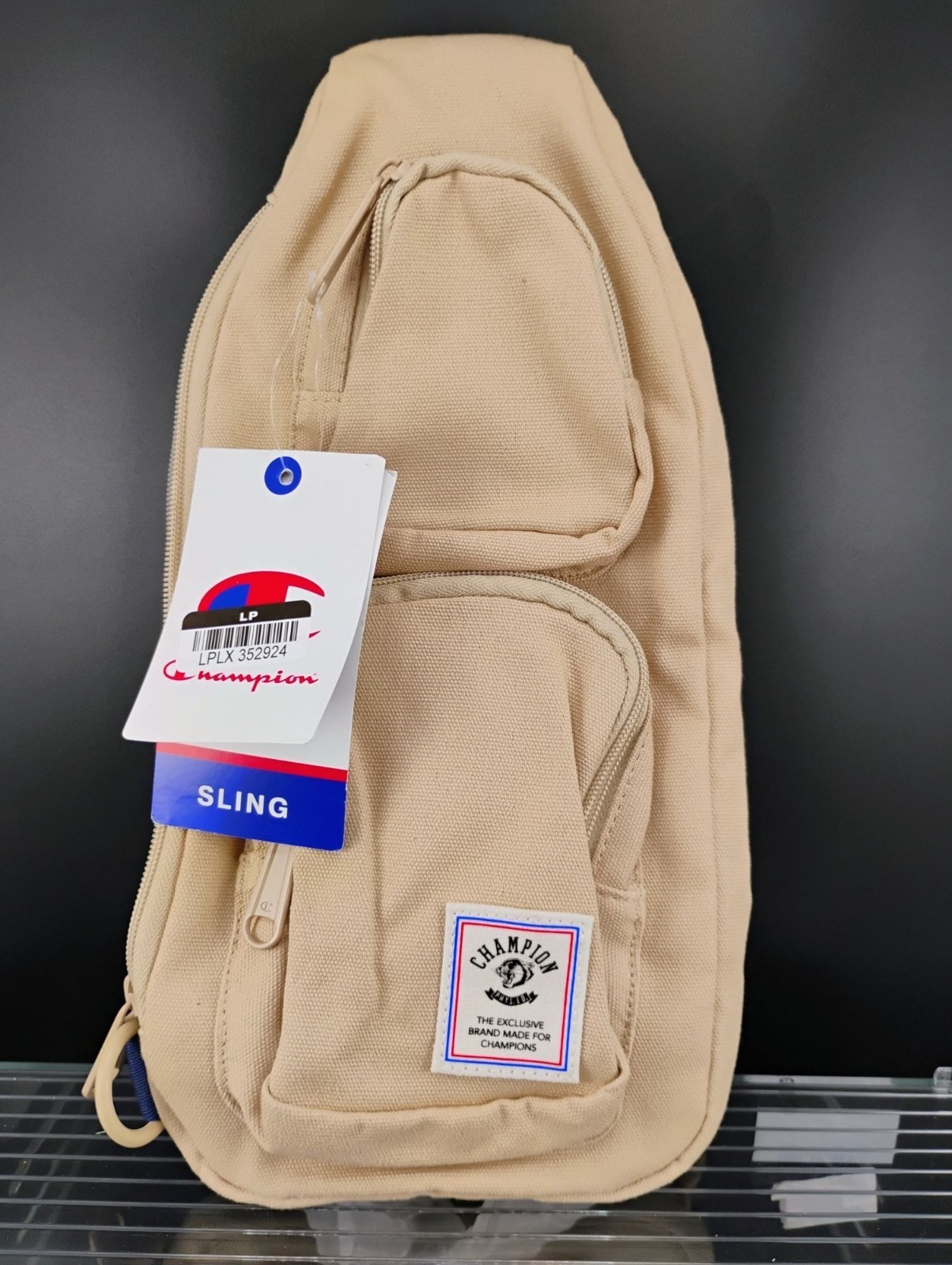 Champion Beige Canvas Sling Backpack Reversible Strap Durable